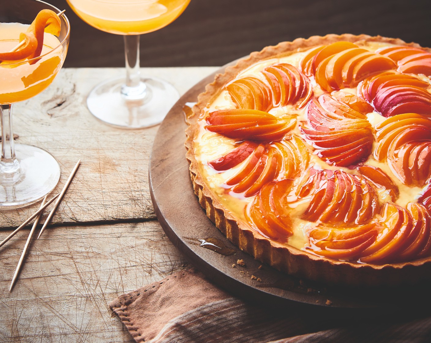 step 4 Slice and de-stone the apricots (12) then arrange on top of the cooled tart. Finish with a generous drizzle of honey (1 tbsp).