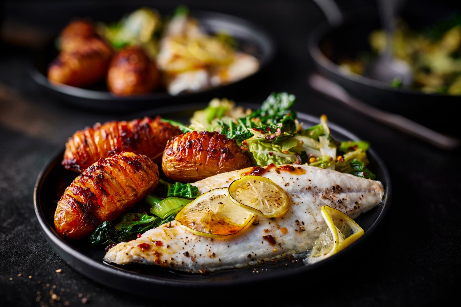 Baked sea bream with hasselback potatoes recipe