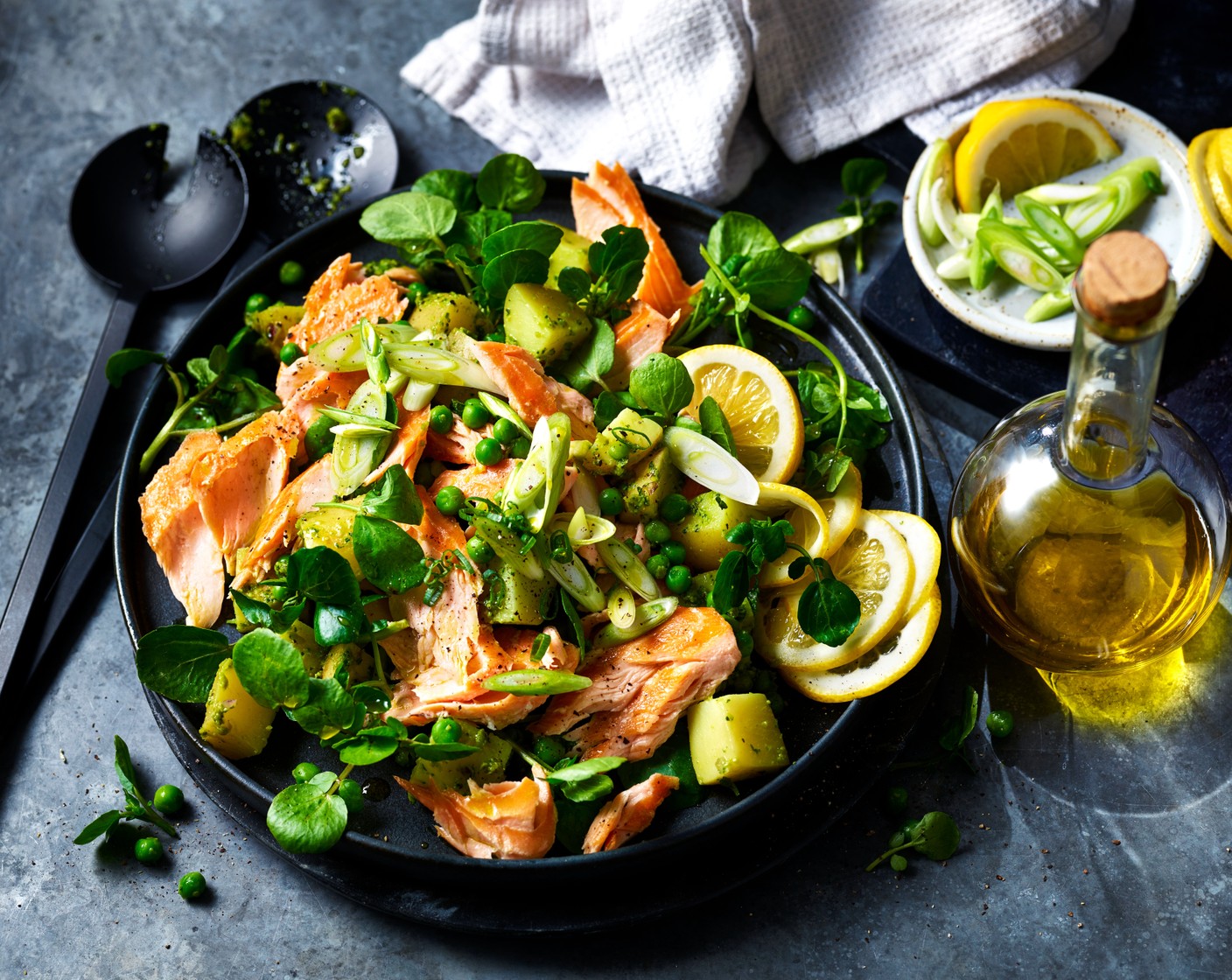 Honey-roast hot smoked salmon with a Jersey Royal, pea and mint salad