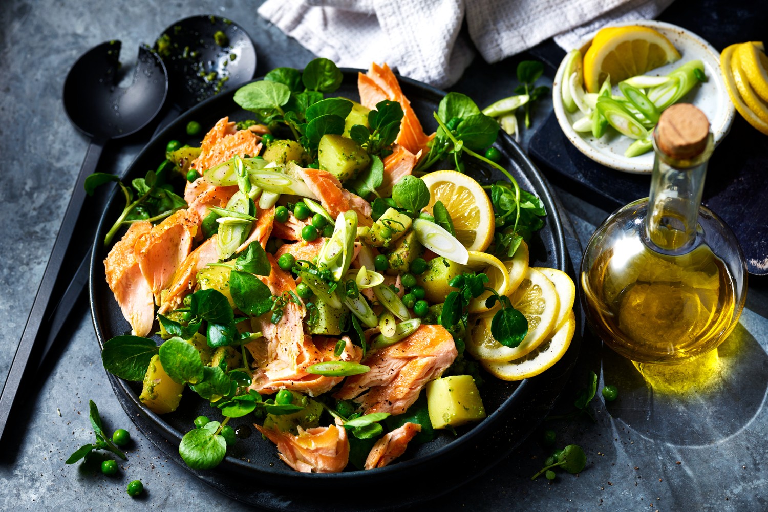 Honey-roast hot smoked salmon with a Jersey Royal, pea and mint salad