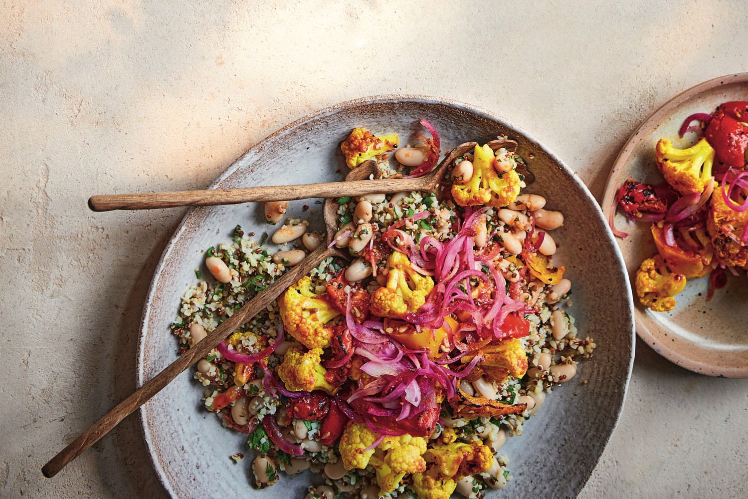 Roasted cauliflower and charred peppers with bean and harissa salad