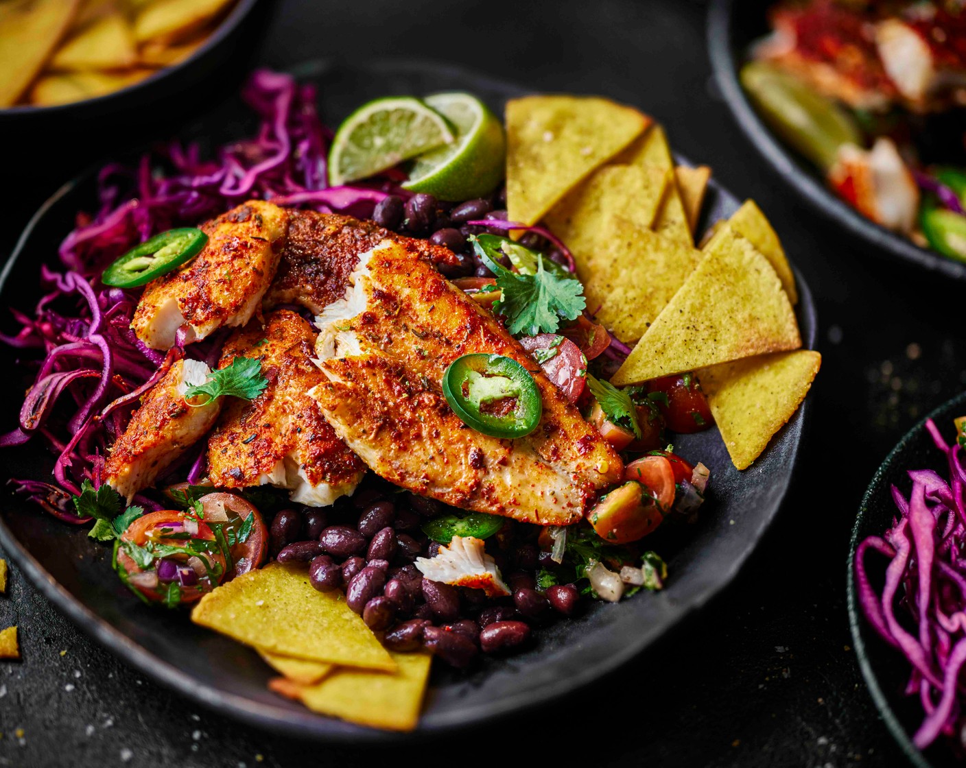 step 5 Season the beans (2 jars) with a little salt and stir in the cumin (1 tsp), then spoon into bowls. Flake over the Cajun basa, and serve with the pickled red cabbage slaw, the pico de gallo and the tortilla chips.