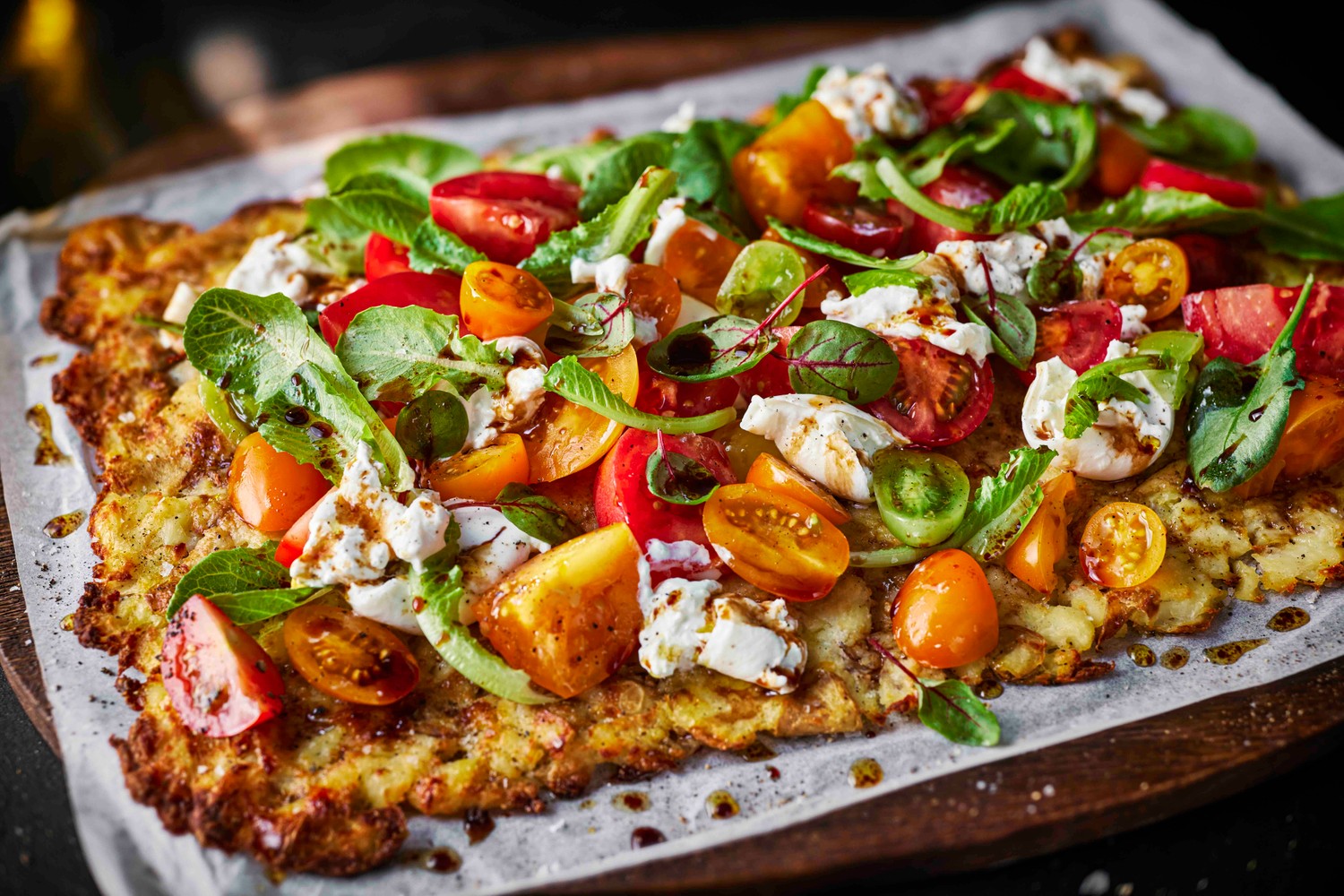 Smashed new potato tart with burrata and tomatoes
