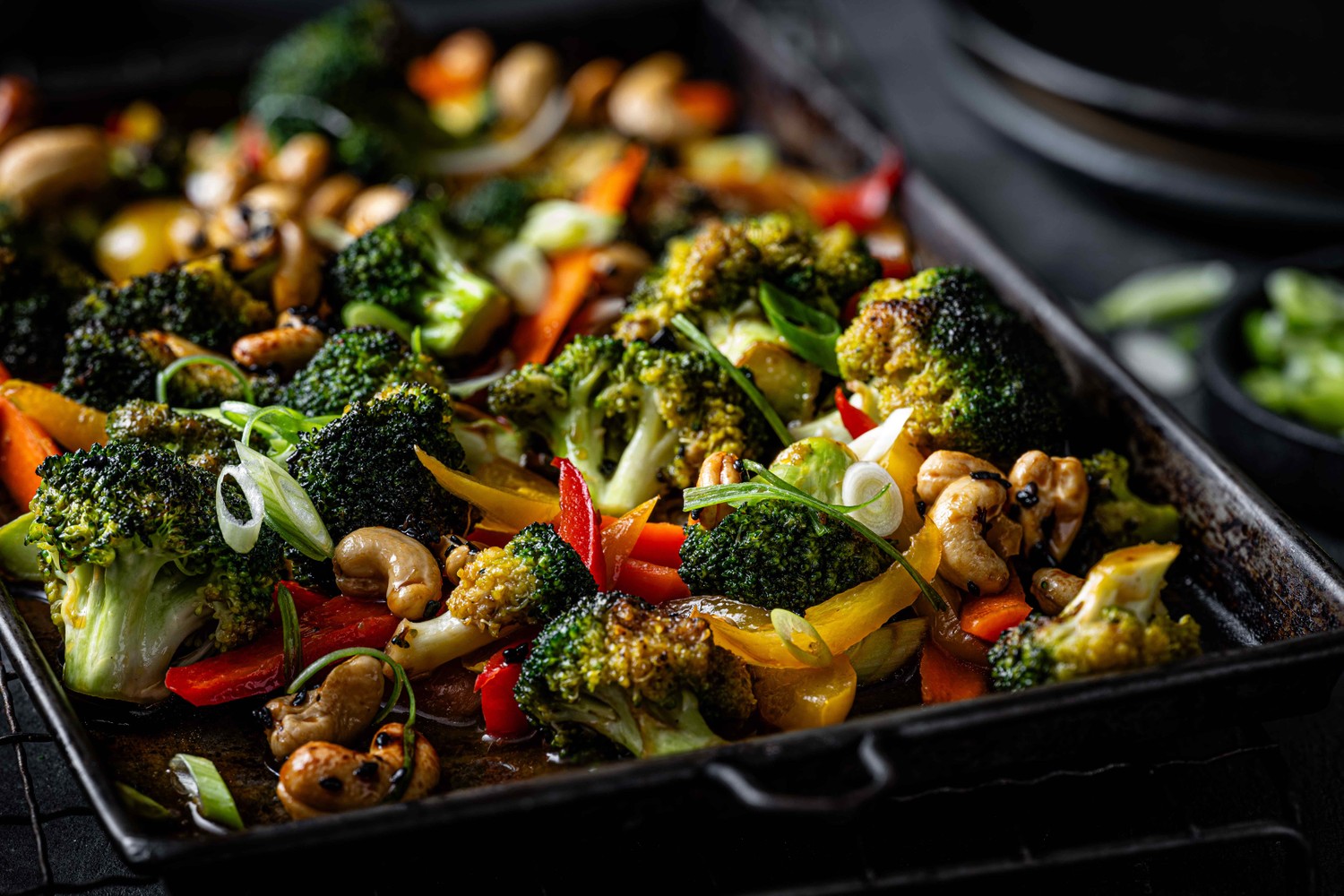 Sweet and sticky broccoli and red pepper stir-fry traybake