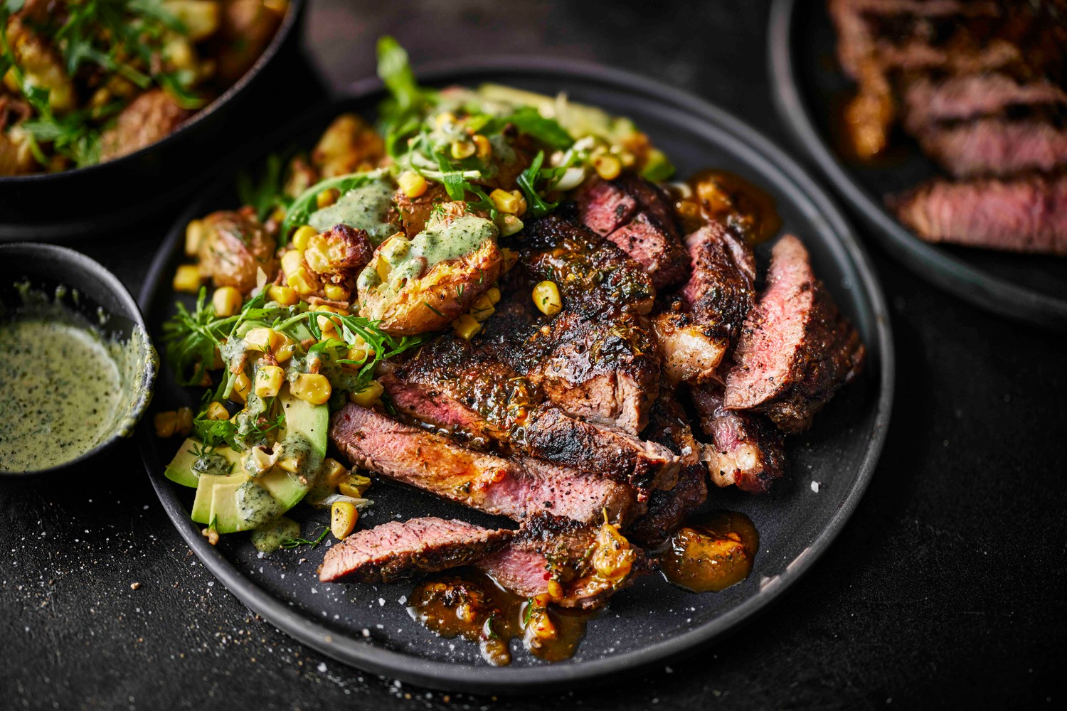 Steak with a smashed potato and corn salad recipe