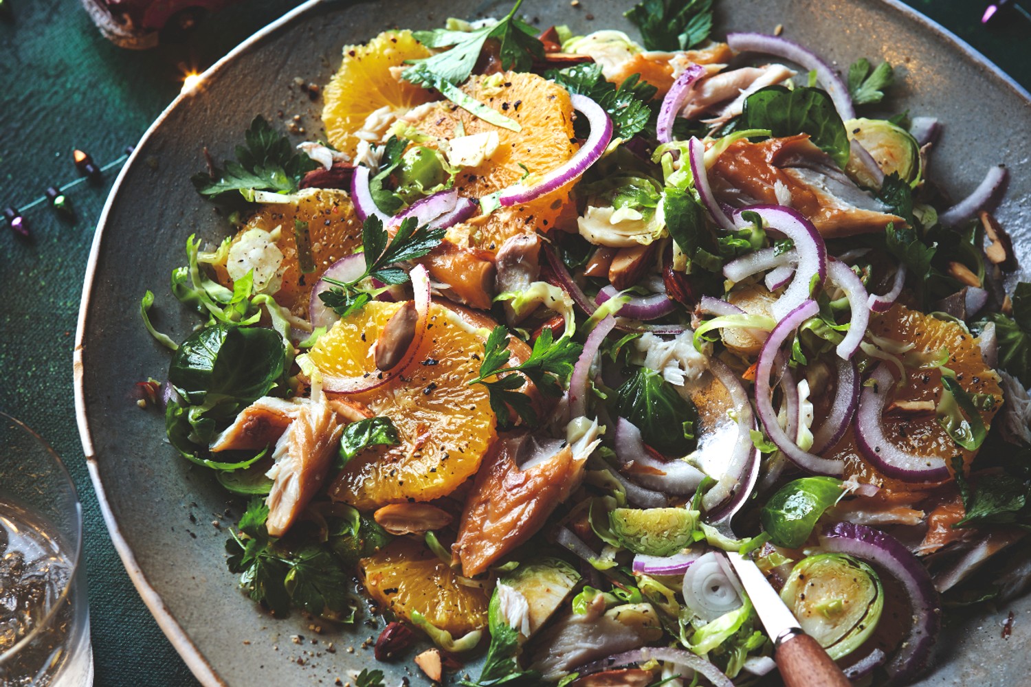 Brussels sprout, mackerel, orange, red onion and almond salad with mixed herbs