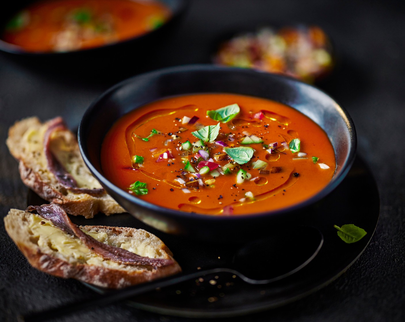 step 4 Serve the gazpacho with the anchovy toasts.