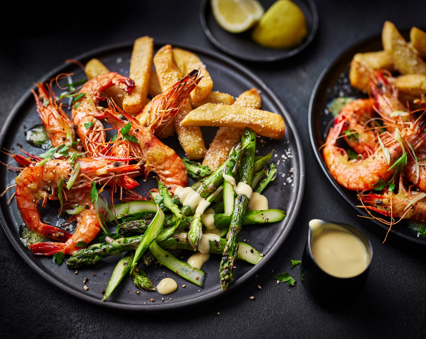 step 8 Serve the prawns alongside the chips and asparagus salad. Pour the hollandaise over the asparagus and dig in.