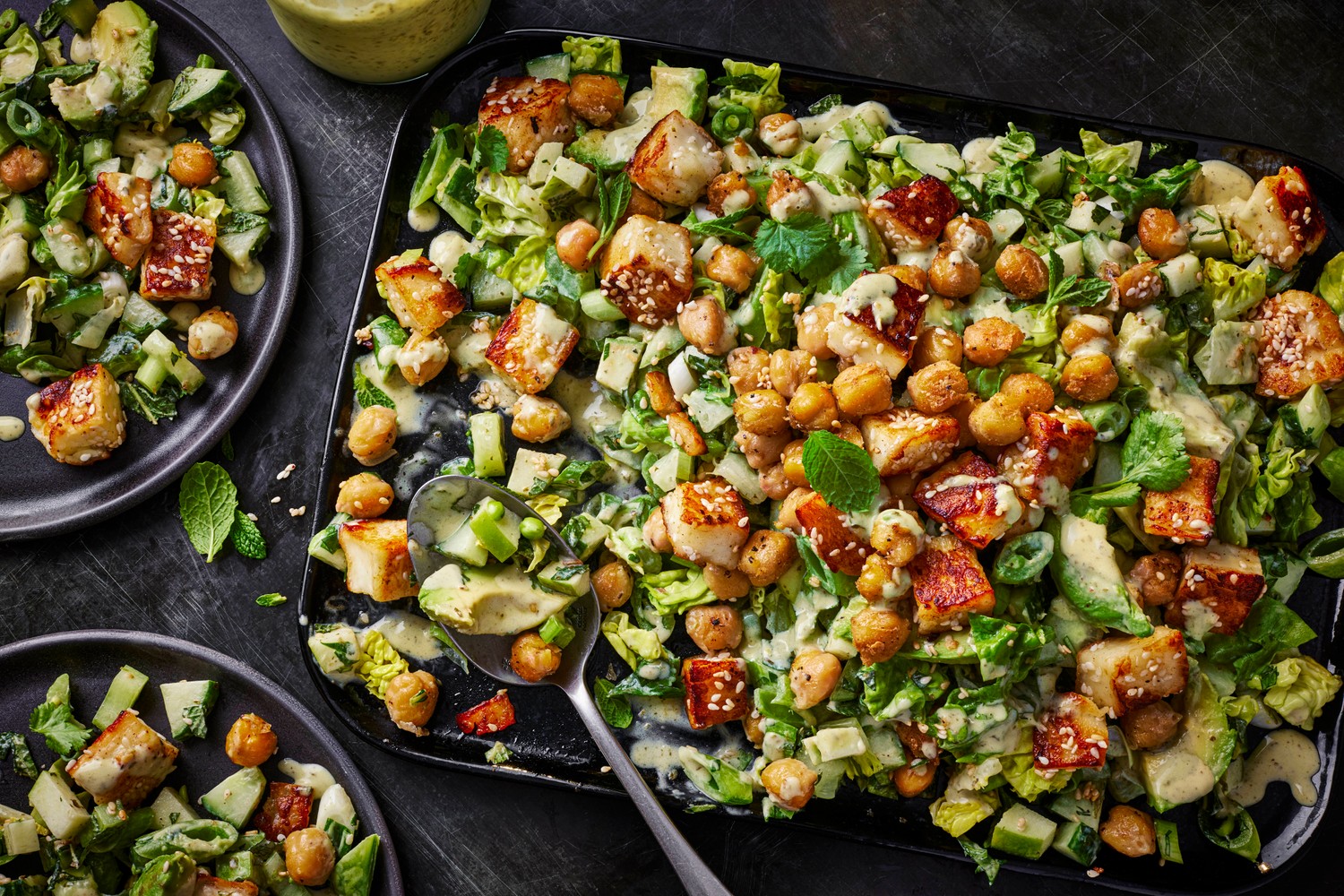 Green goddess chopped salad with crispy chickpeas and halloumi