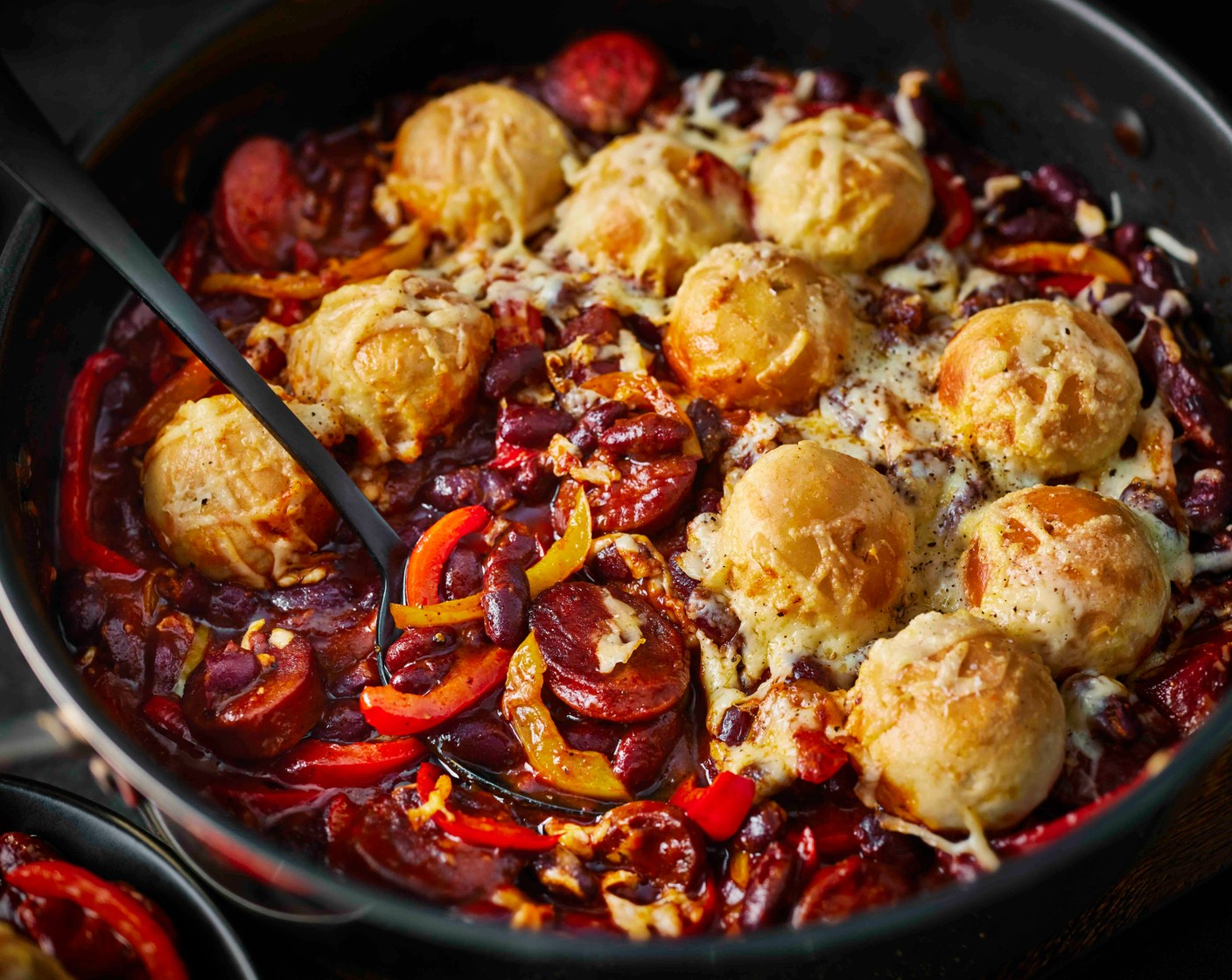 step 5 Bake for 10 minutes, until the dough balls are cooked through and golden and the cheese is melted and bubbling.