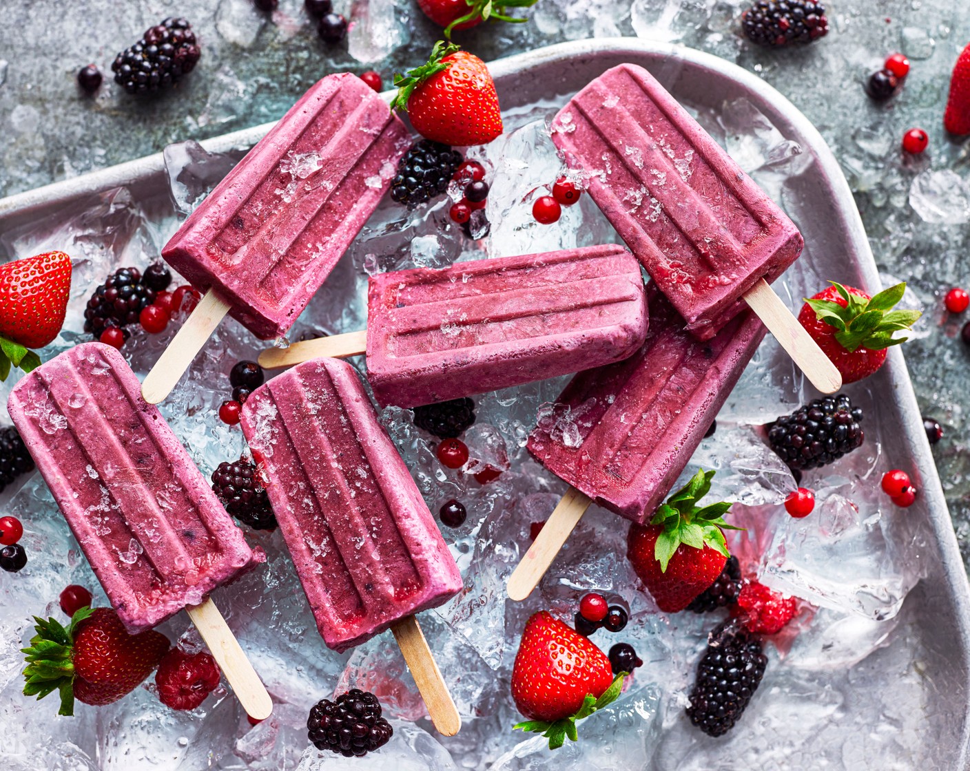 step 2 Spoon into six lolly moulds and freeze until set – for at least 4 hours – then dig in.