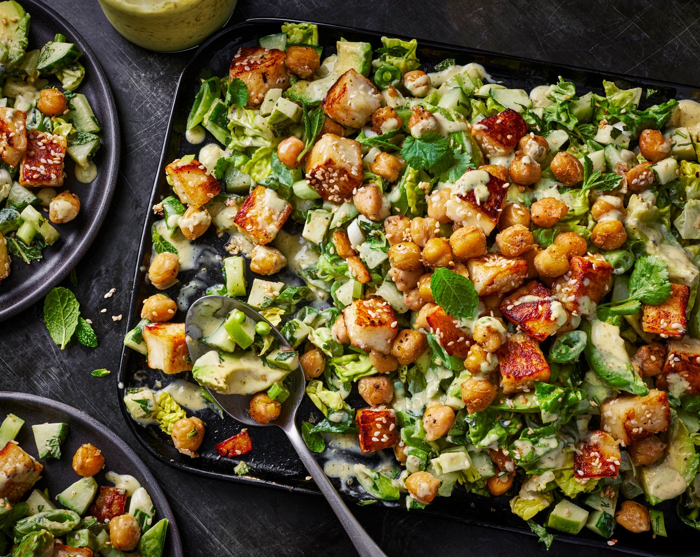 step 4 Serve the salad with the crispy chickpeas and halloumi and some extra fresh mint and coriander.