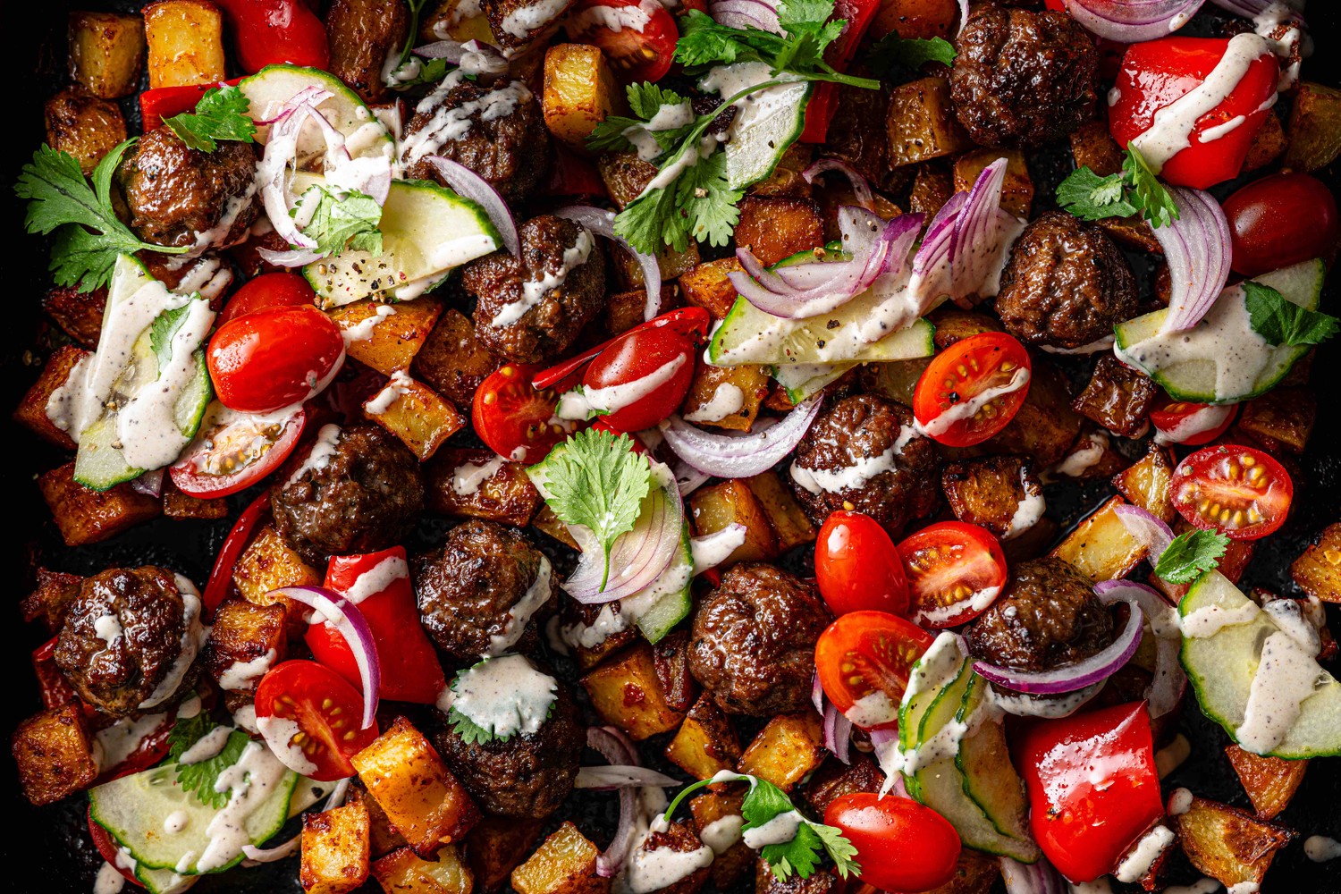 Potato and meatball traybake recipe