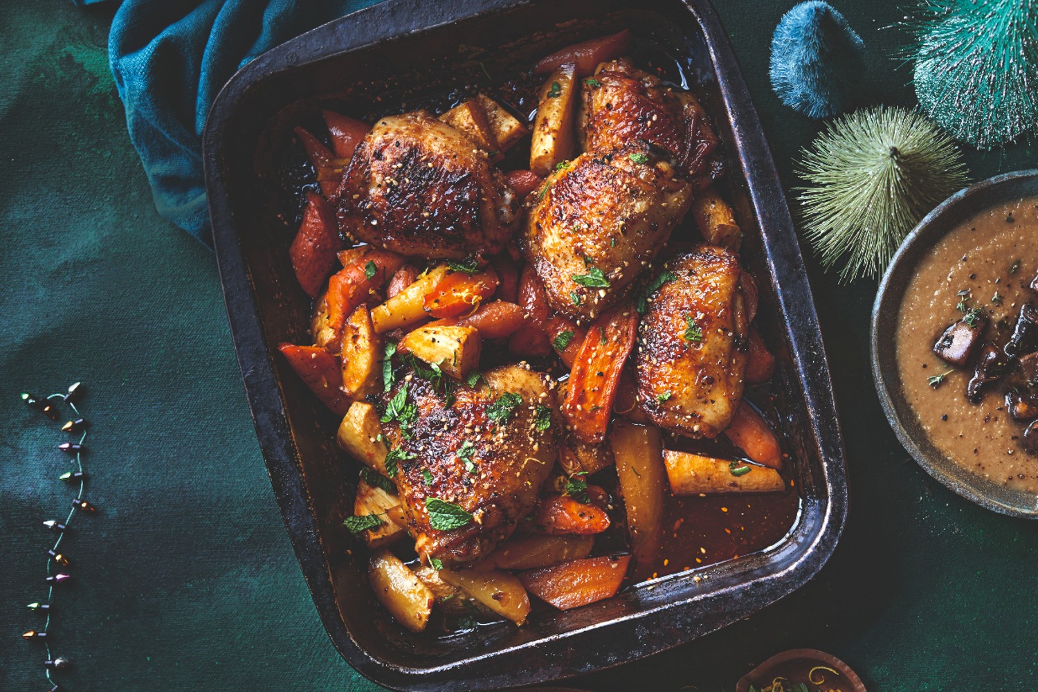 Sticky harissa roasted chicken, parsnip and carrot traybake