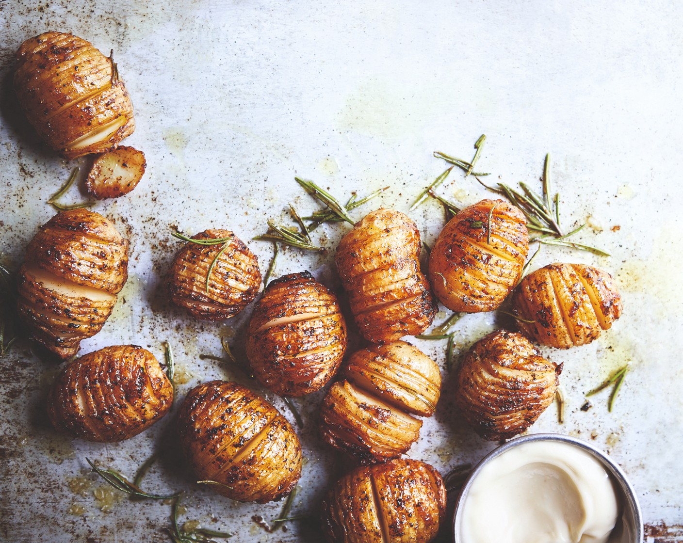 step 3 Sprinkle with sea salt (to taste), add the fresh rosemary (1 sprig) and bake for 40-50 minutes, until golden brown. Finish with a little extra sea salt and more Cook With M&S magic sprinkle, and serve with truffle mayo (as needed).