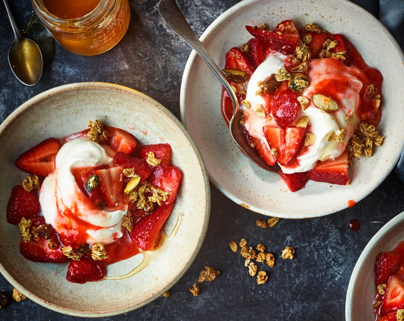 step 5 Add a spoonful each of macerated strawberries to the bases of 4 serving bowls, then divide the cream mixture between each. Spoon over the remaining macerated strawberries and sprinkle over the remaining granola to serve.