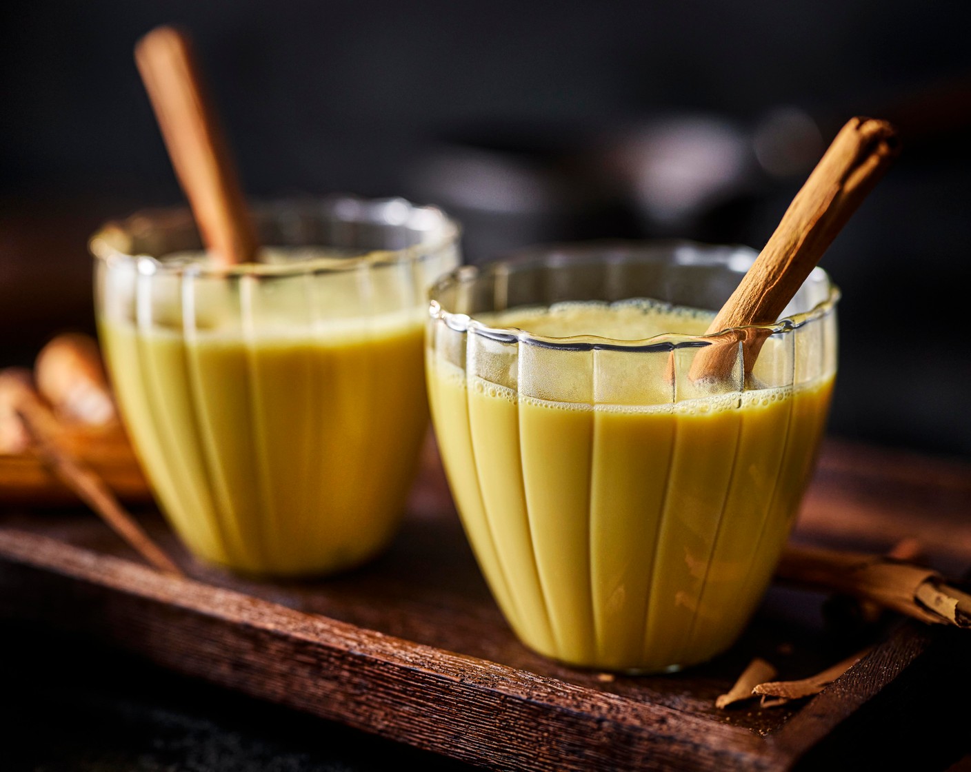 step 2 Strain through a fine mesh sieve into four mugs, garnishing with the cinnamon sticks, if you like.