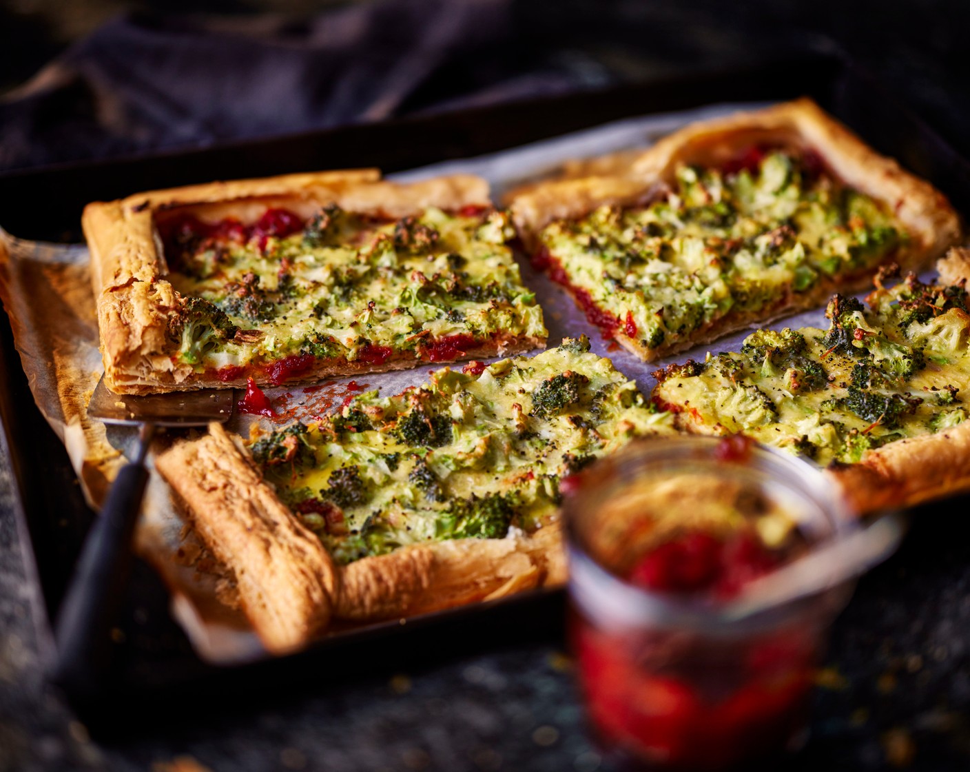 step 4 Top with the cream and broccoli mixture. Pop back into the oven to bake for another 10-15 minutes, until the mixture has set and the broccoli is tender. Serve with more tomato chutney, if you’d like.