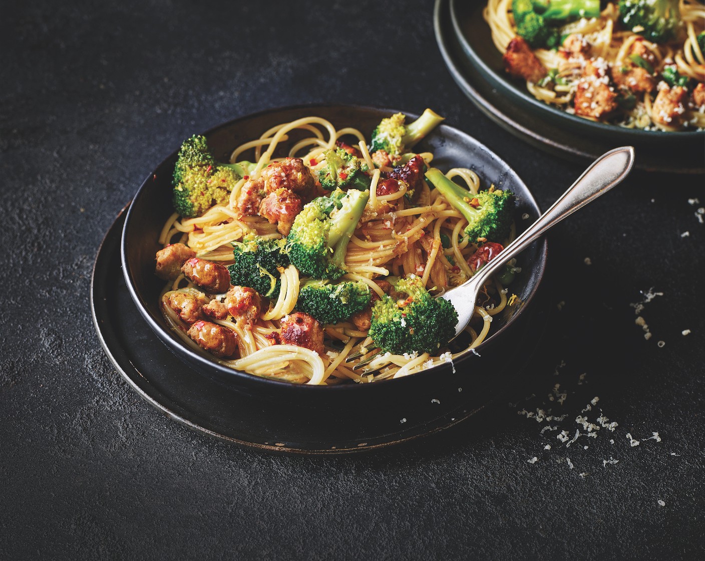 step 4 Using a slotted spoon, lift the pasta from the pan and toss together with the broccoli and sausage mix, adding a little pasta water and tossing until you have a glossy sauce. Serve with the grated cheddar (1 handful) on top.
