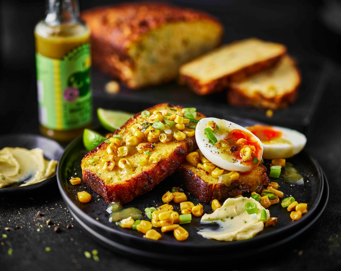 step 9 Peel and halve the eggs. Serve with the cornbread, the charred corn and spring onions, the lime butter and the jalapeño hot sauce (to taste).