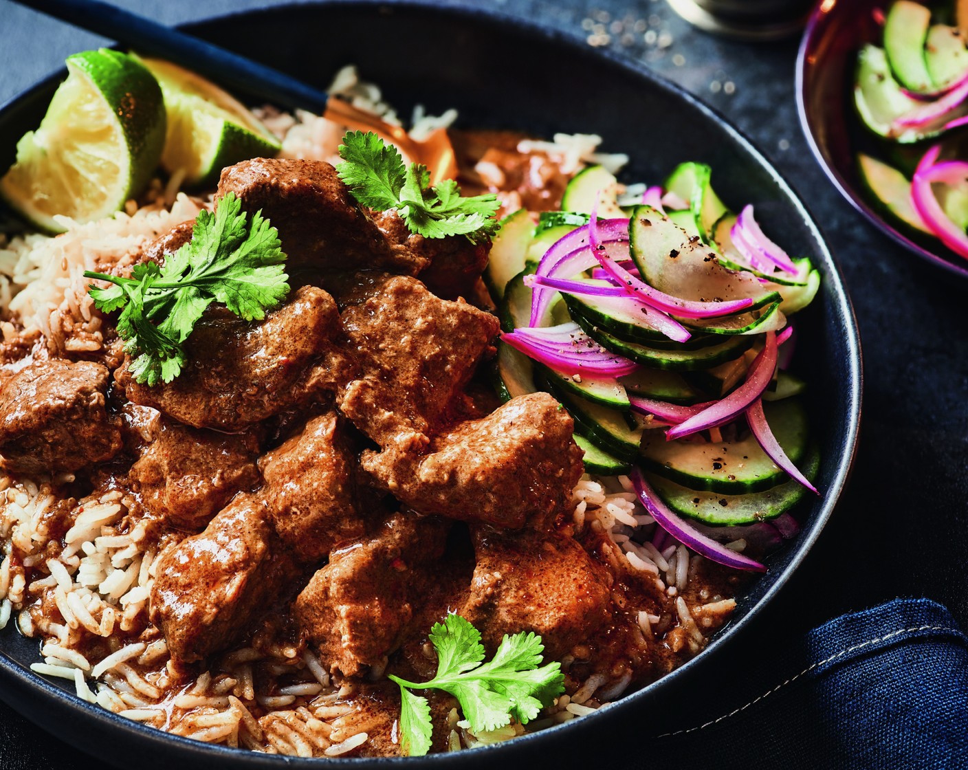 step 5 Serve the curry in warmed bowls, along with rice (450 g) and pickled vegetables (to taste), garnished with coriander leaves (to taste) and lime wedges (to taste).