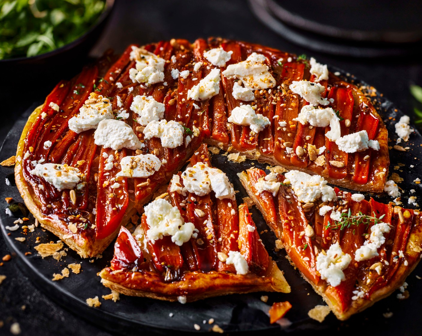 step 8 Top with the crumbled goat's cheese (1 pack) and a sprinkle of dukkah (2 tbsp). Finish with a pinch of flaky sea salt and serve warm.
