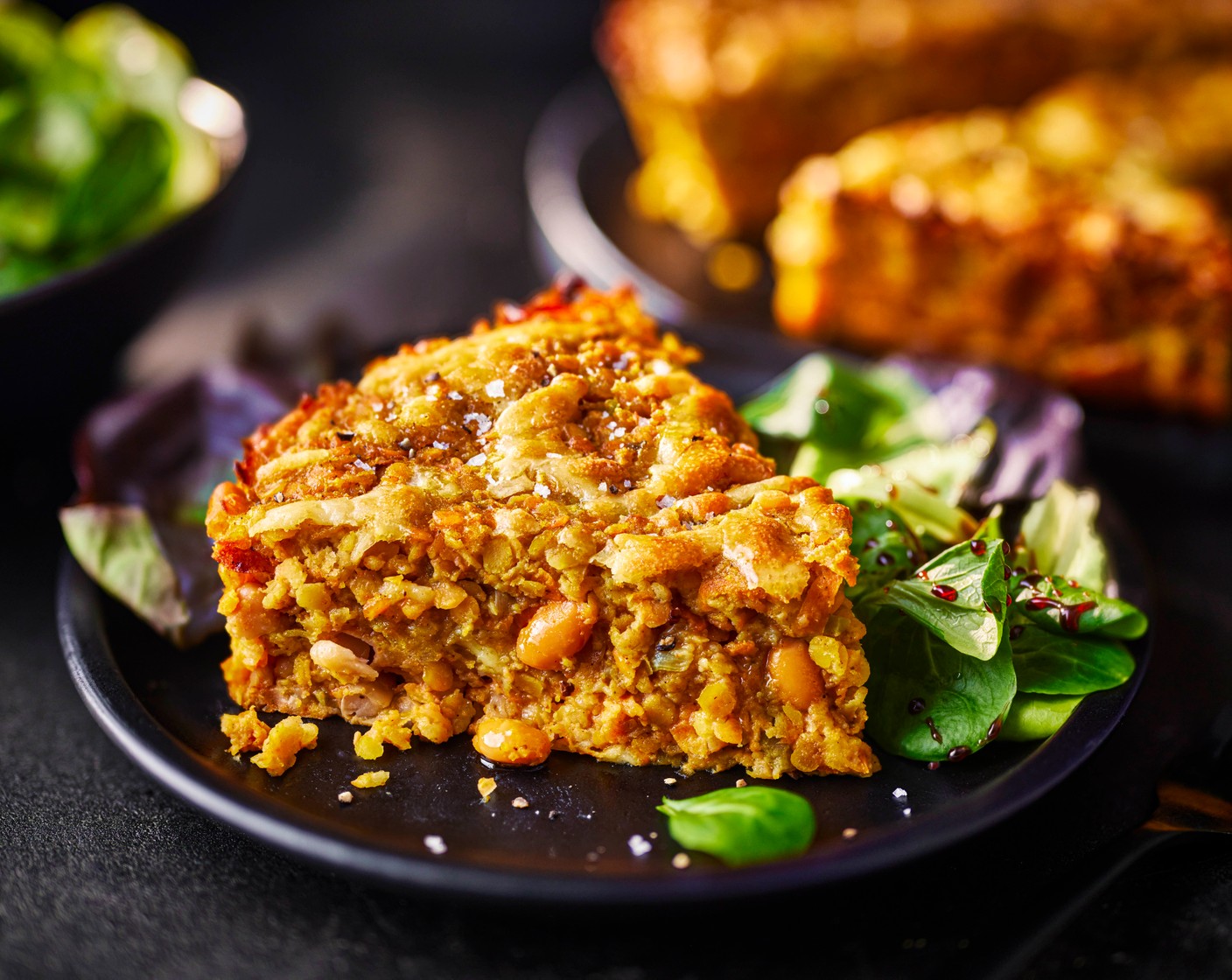 step 5 Bake for 20-25 minutes, until golden. Allow to cool slightly before slicing into pieces. Serve with the salad (75 g), dressed with a little of the rich balsamic dressing (1 tbsp).