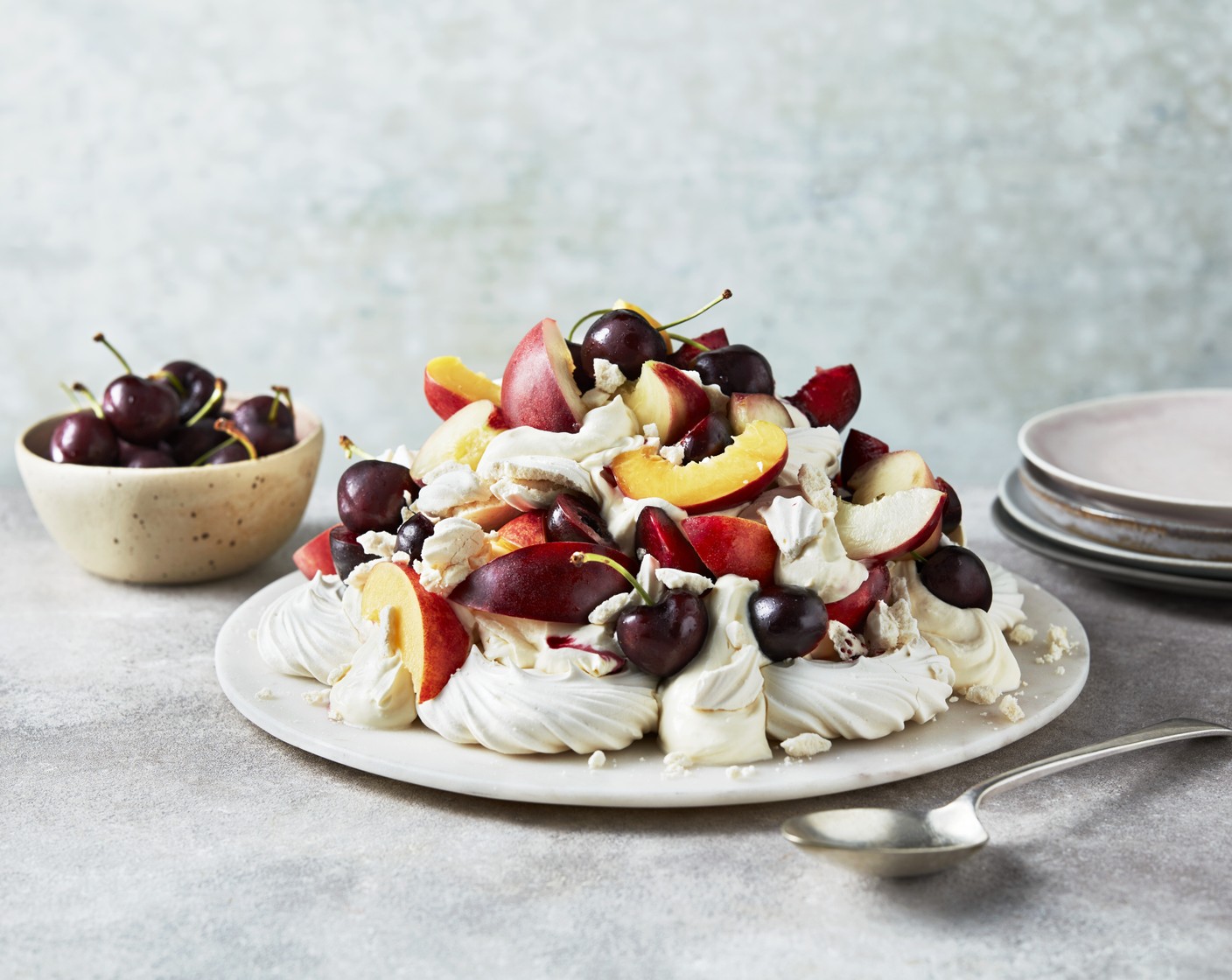 step 1 On a large, round plate, pile up meringue nests (8), then top with whipped cream (300 ml), pitted and sliced stone fruits such as nectarines (2), apricots (4) and cherries (200 g), and more crumbled meringue. It’s perfect with a glass or two of prosecco.