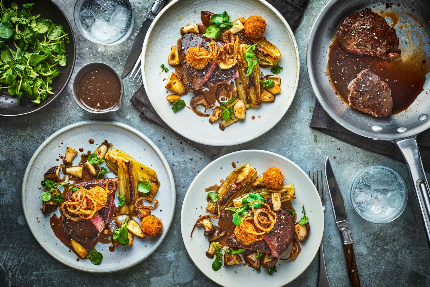 Beef fillet with beef bonbons, wild mushrooms and seared fennel