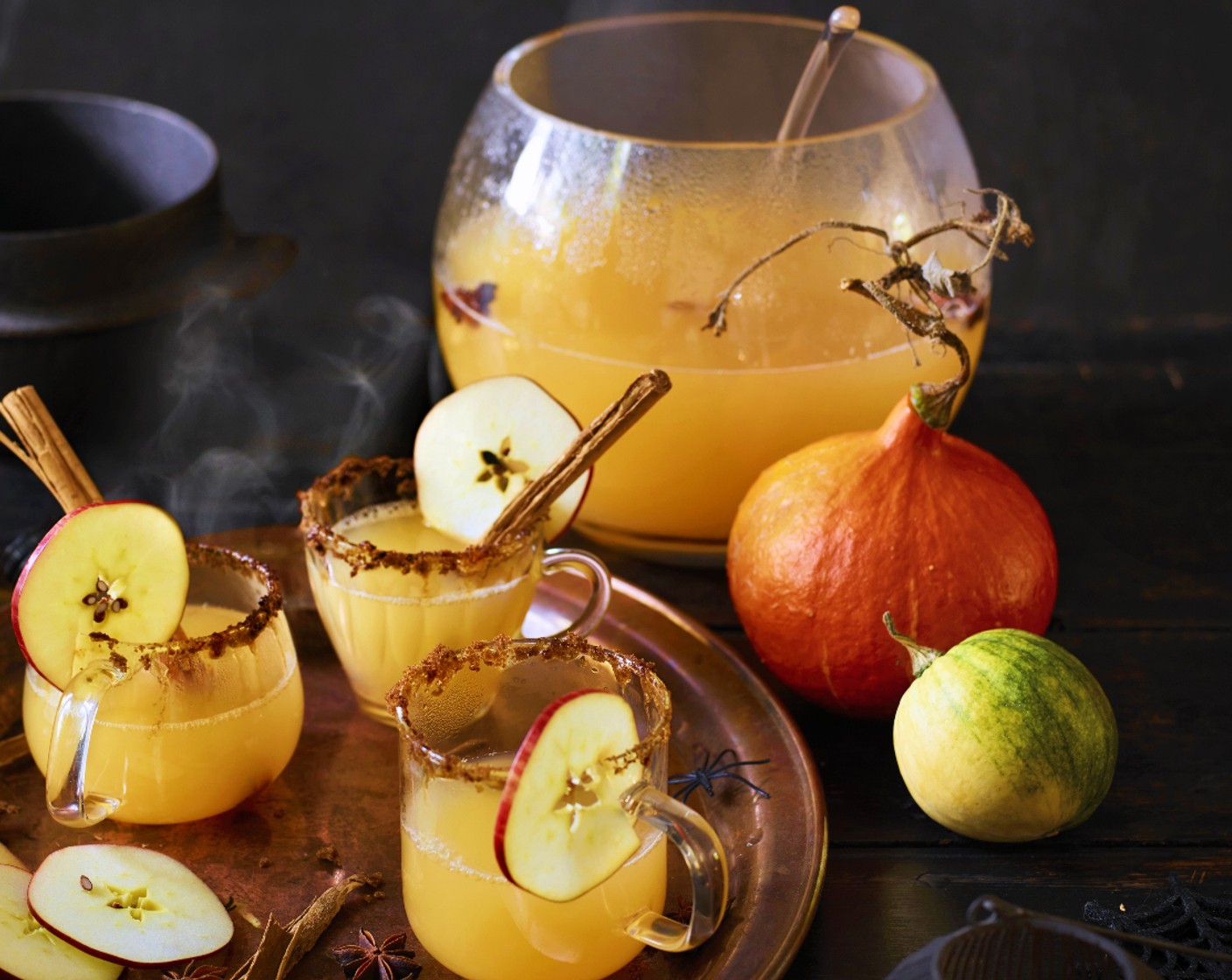 step 3 Pour the warmed punch into the glasses and garnish with apple slices (to taste), cinnamon sticks (to taste) and star anise (to taste).
