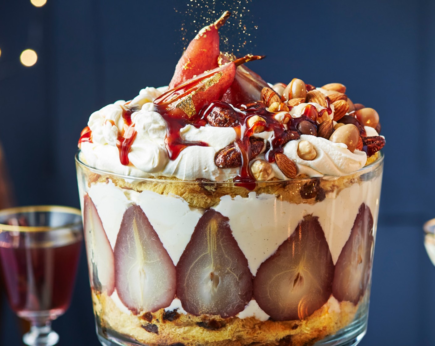 step 4 Top with the pear halves, blond chocolate and caramelised pecans (to taste) and a drizzle of the remaining mulled wine.