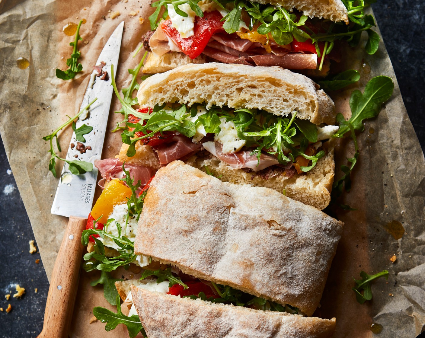 step 7 Slice each ciabatta in half lengthways then drizzle with olive oil (to taste) before layering in your cheese (to taste), ham (to taste), rocket (to taste) or favourite fillings.