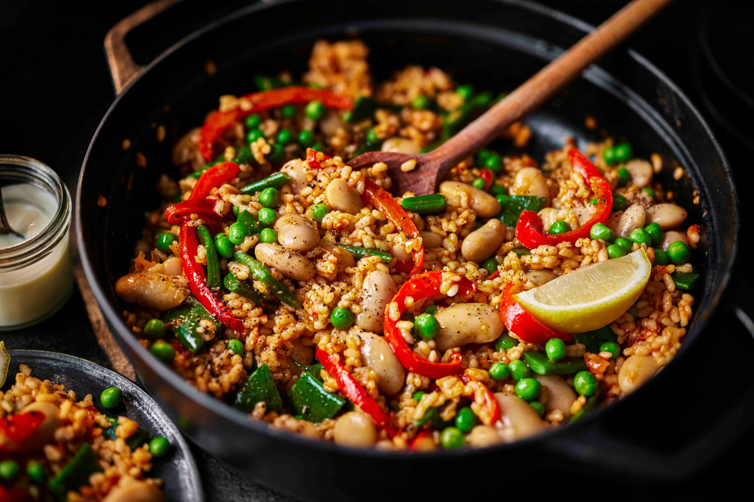 Healthy red pepper, pea and butter bean paella