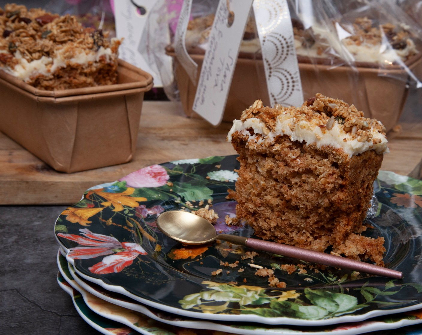 step 6 Meanwhile, make the buttercream. Beat the butter (125 g) until light and fluffy, add the honey (3 tbsp) and gradually beat in the icing sugar (200 g) until light and fluffy. Spread over the cake and scatter with granola (1 handful).