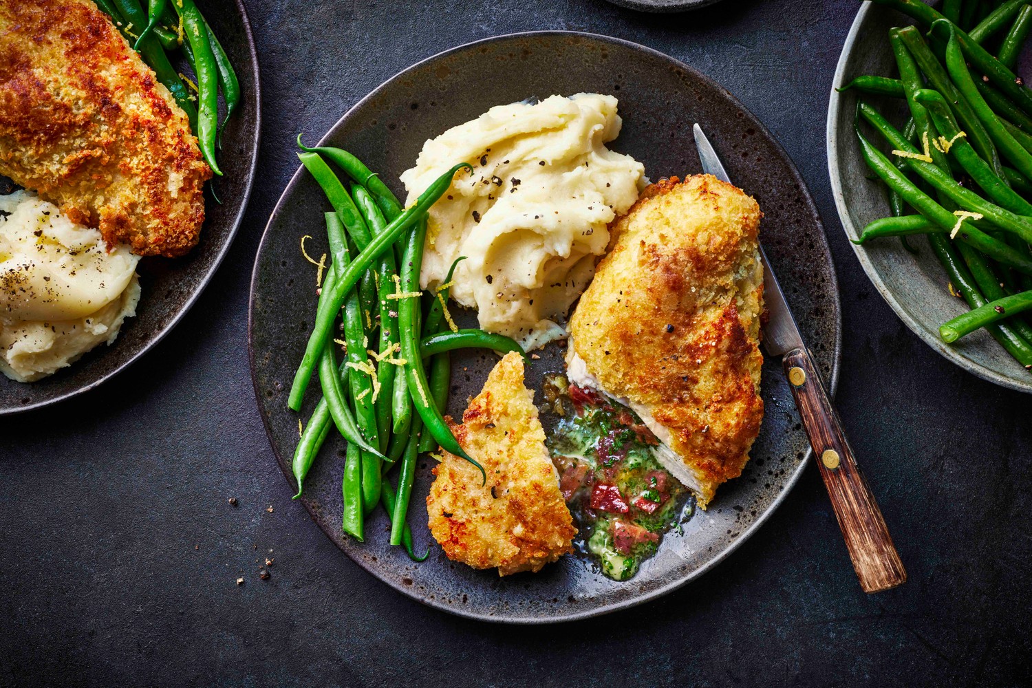 Parmesan and bacon Kyiv with cheesy mash and green beans