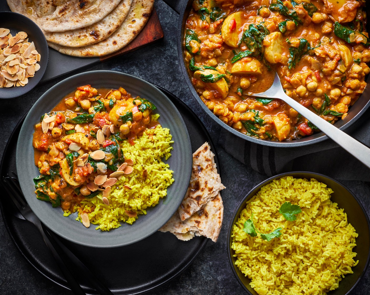 step 10 Serve the curry sprinkled with the flaked almonds (1 handful), rice and bread on the side.