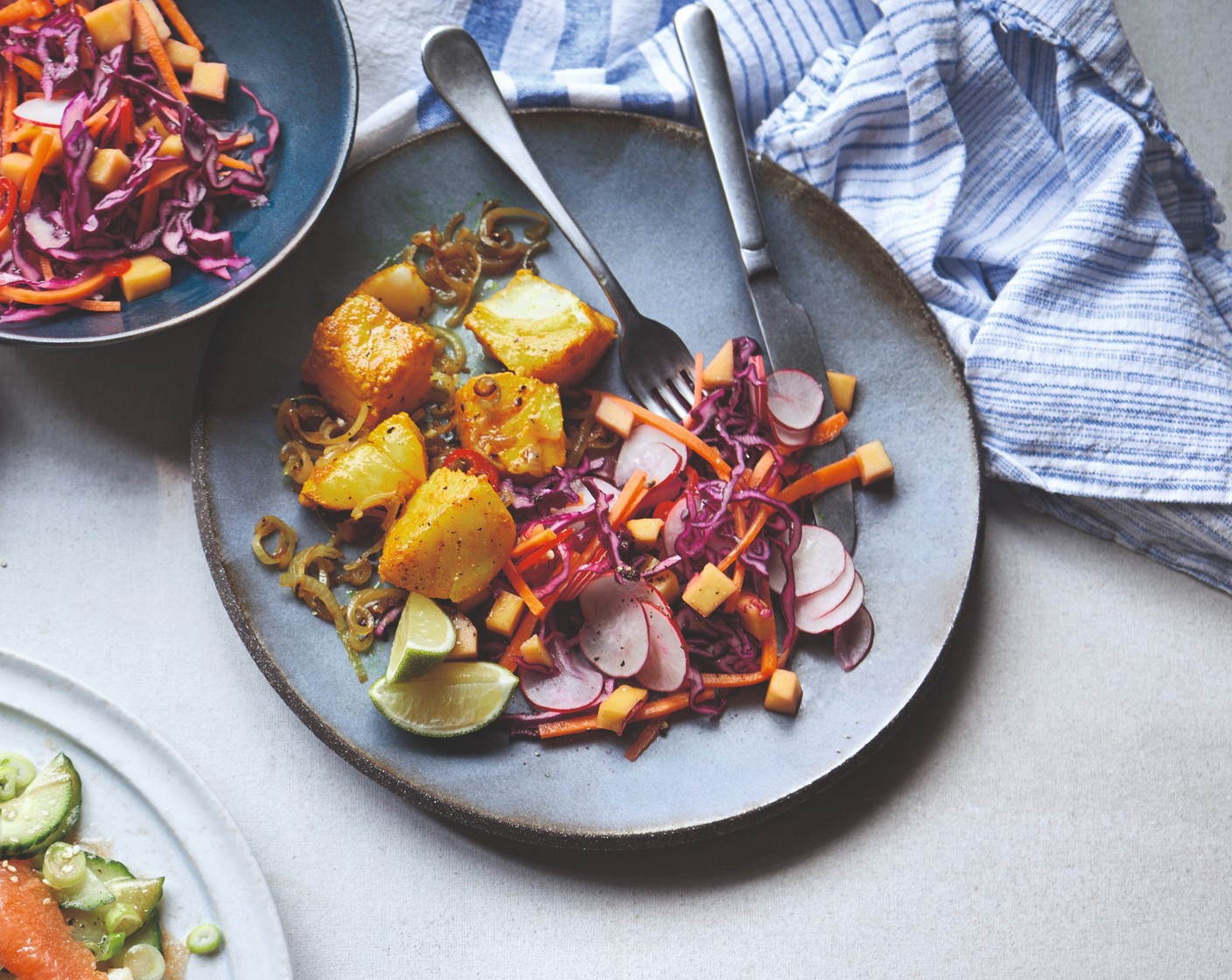 step 4 Serve the cod with the salad and the lime wedges (1).