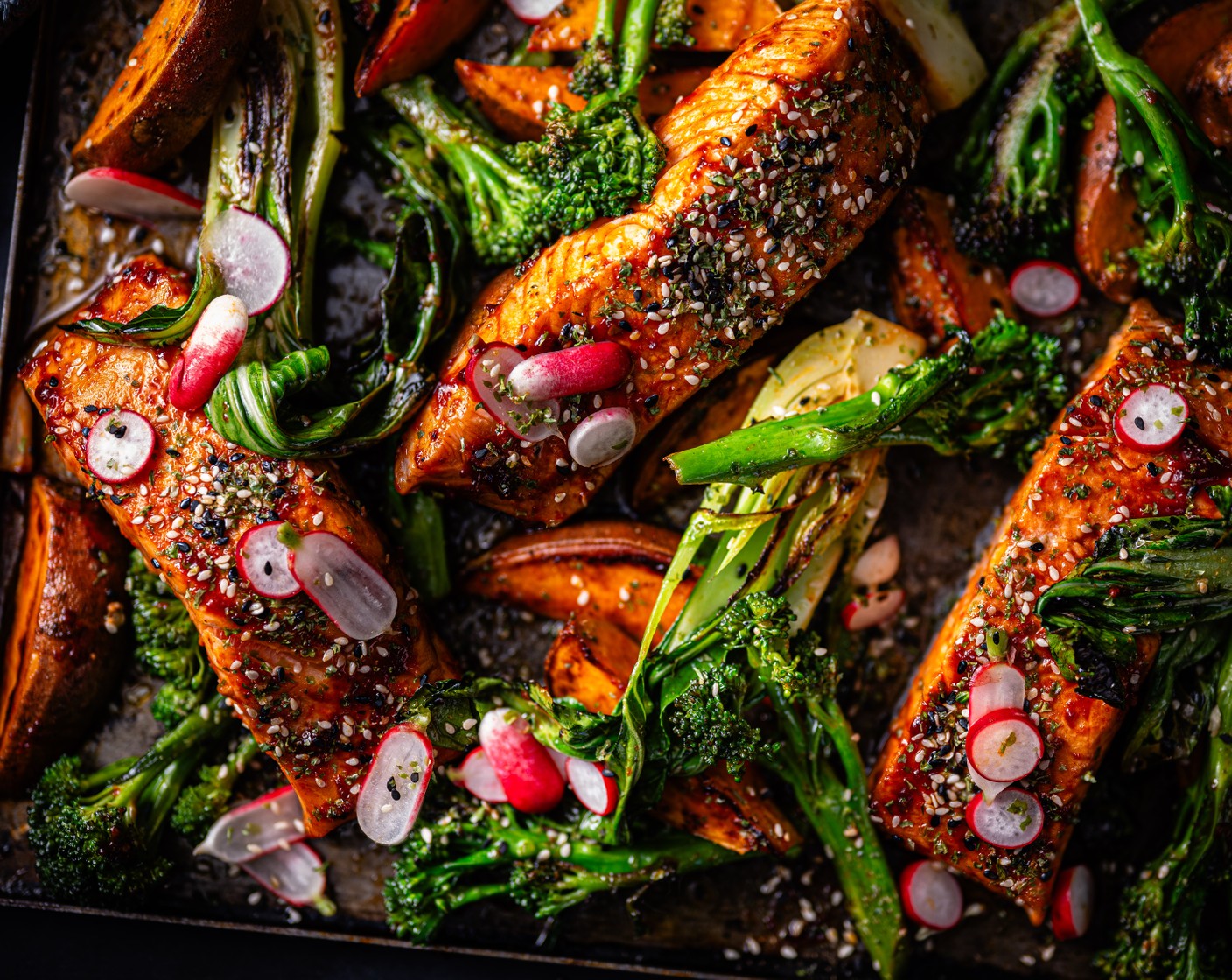 step 4 Once the salmon is cooked, scatter over the Korean seasoning packet. Serve with the pink pickled radishes.