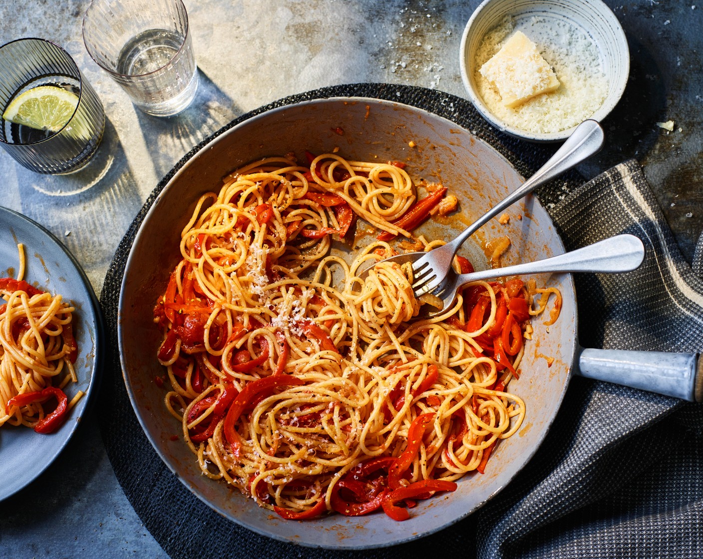 step 4 Meanwhile, cook the M&S Remarksable Value spaghetti (400 g) according to the pack instructions.  Use tongs to remove the pasta and add to the sauce, adding a splash of pasta cooking water if needed. Toss until glossy.