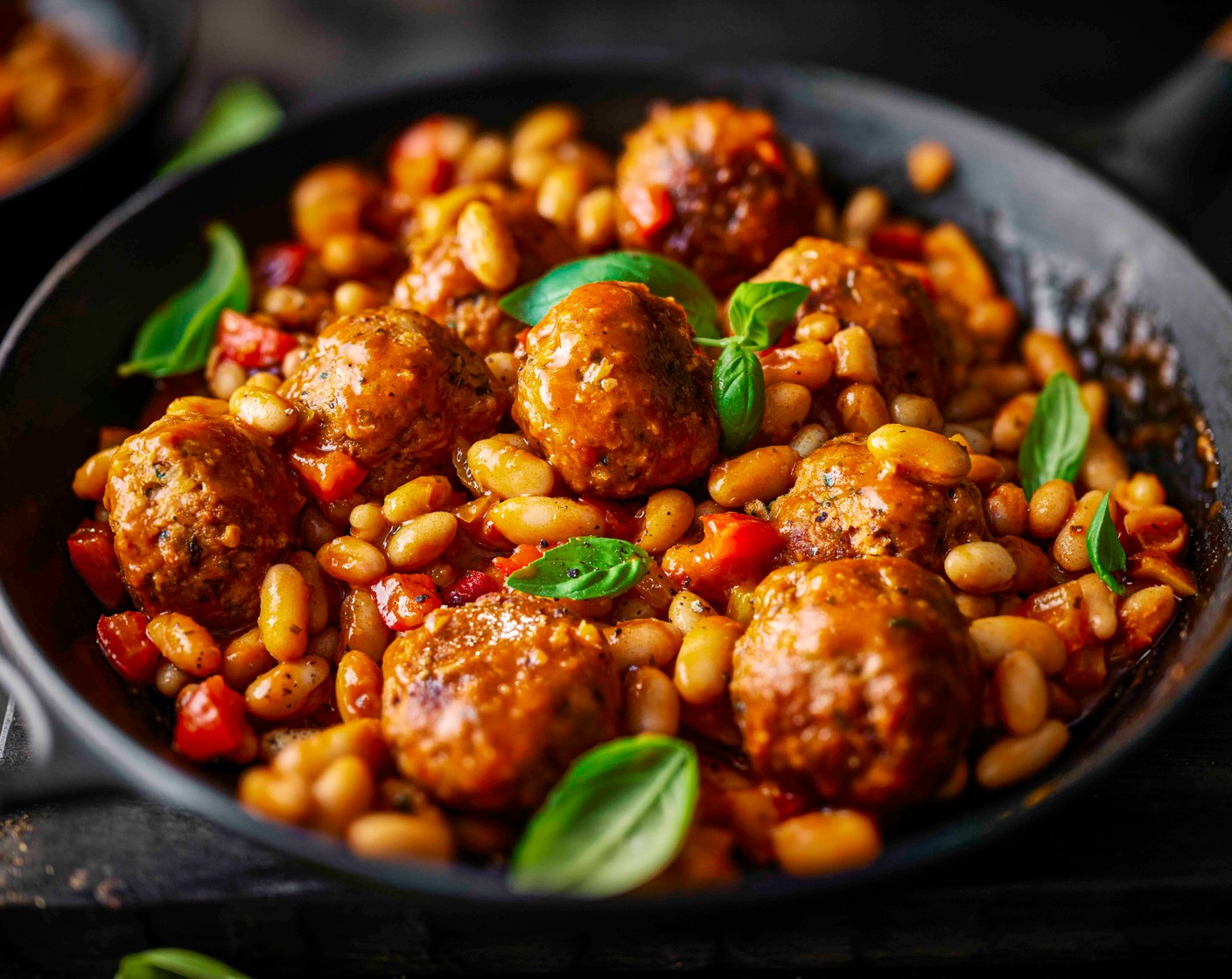 step 6 Serve the stew in bowls with the remaining basil (12.5 g) scattered on top.