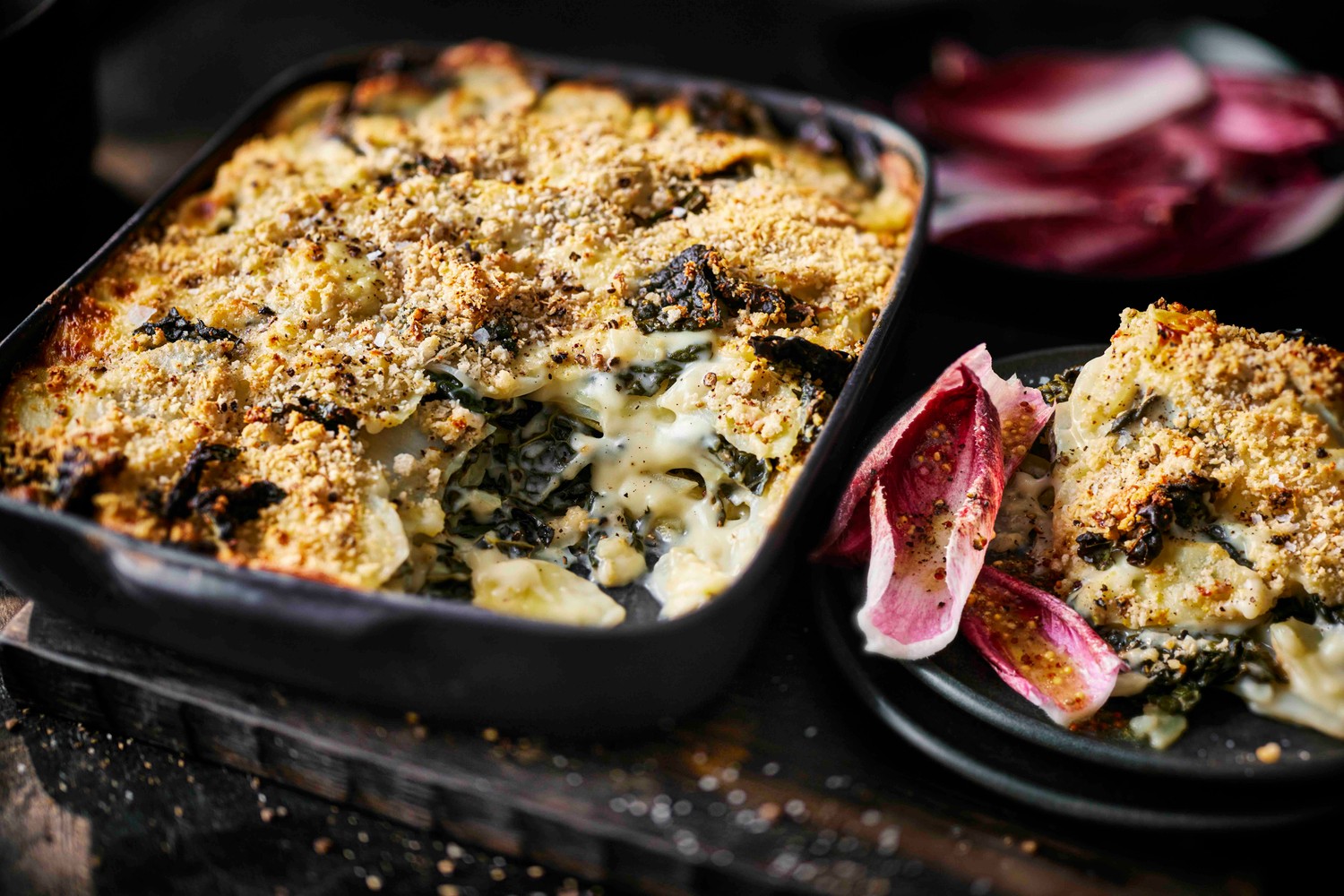 Cheesy potato and cavolo nero bake