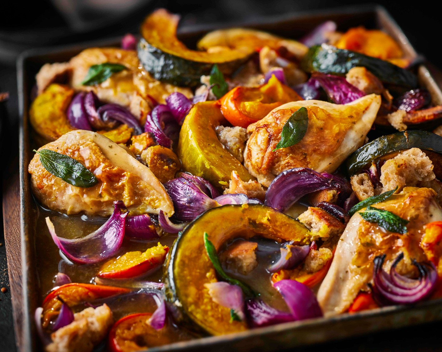 step 5 Divide the traybake between plates, spoon over the gravy and scatter with the remaining sage to serve.