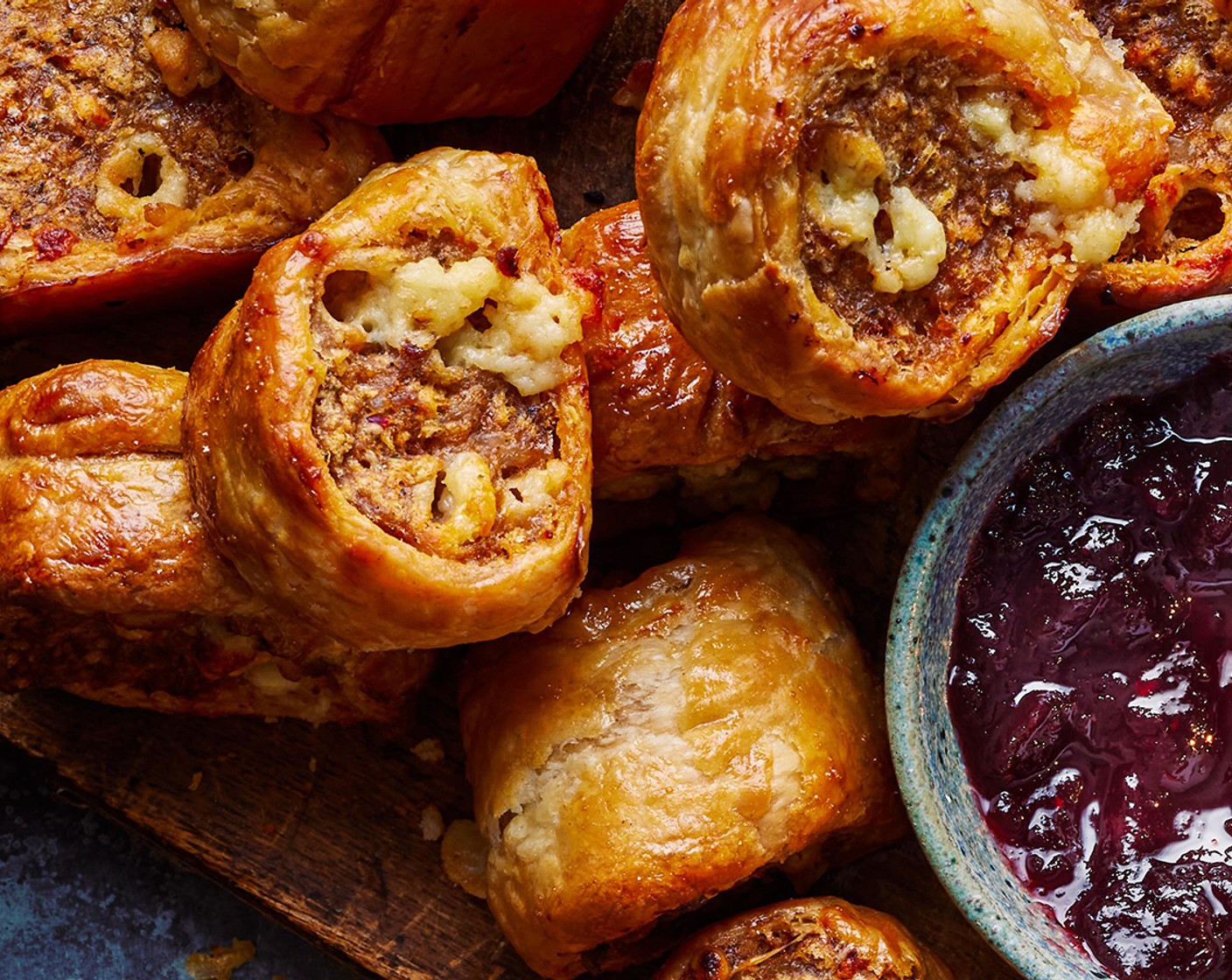 step 5 Arrange on baking sheet, lined with baking paper. Cook for 30 minutes, until golden and cooked through. Serve with the cranberry and port sauce (2 tbsp).