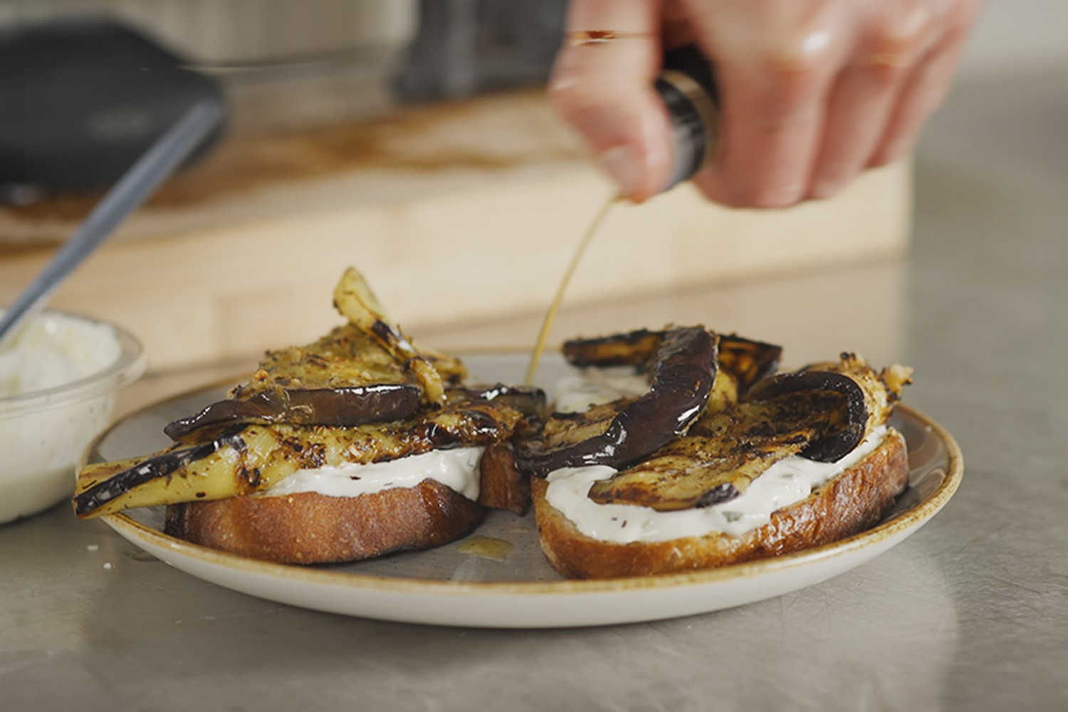 Aubergine and tzatziki crostini