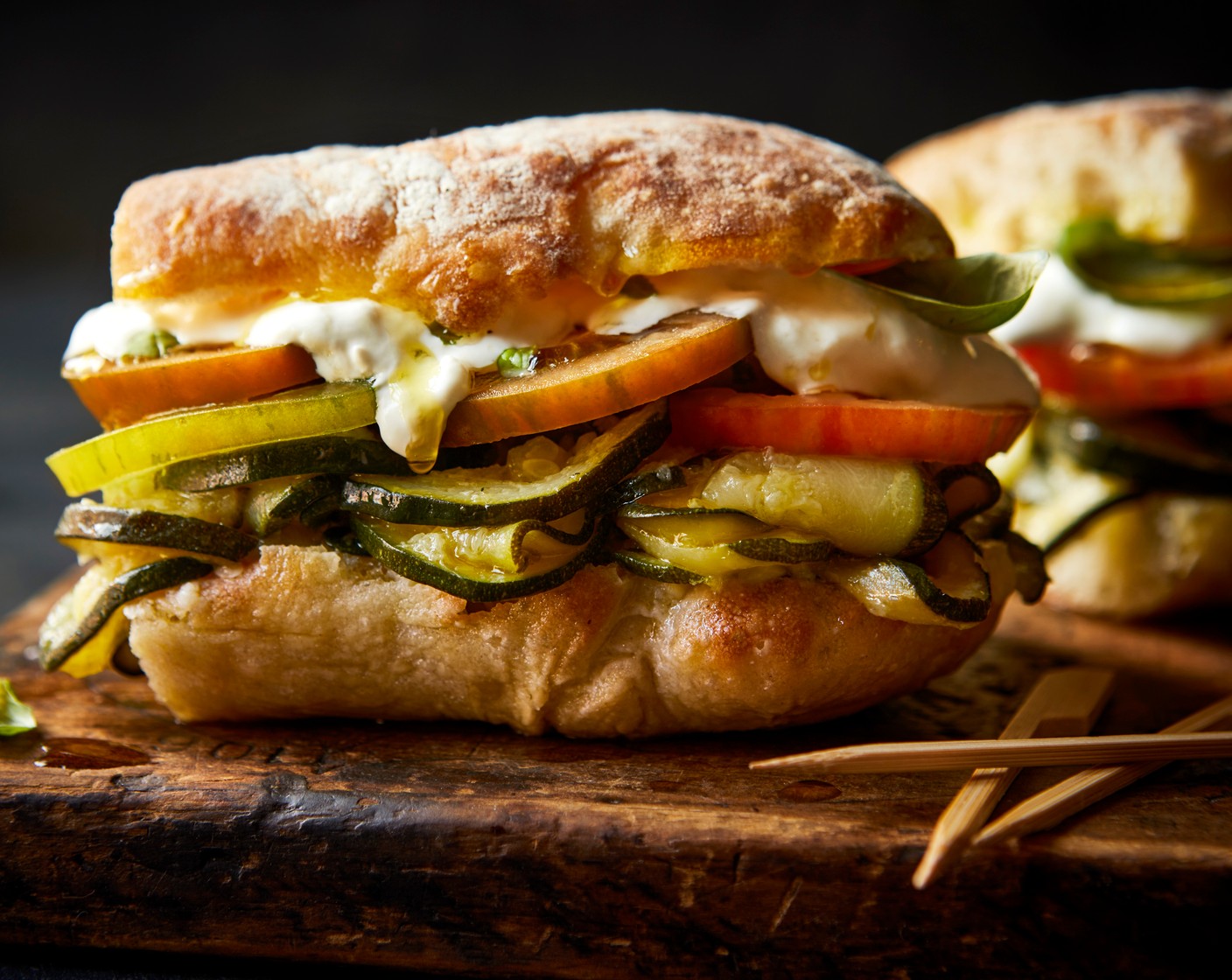step 5 When you’re ready to serve, assemble the ciabattas with the courgettes, tomatoes (3) and stracciatella (1 pack), then add a large handful of fresh basil (25 g) to each (use like salad leaves!). Sandwich together and dig in.