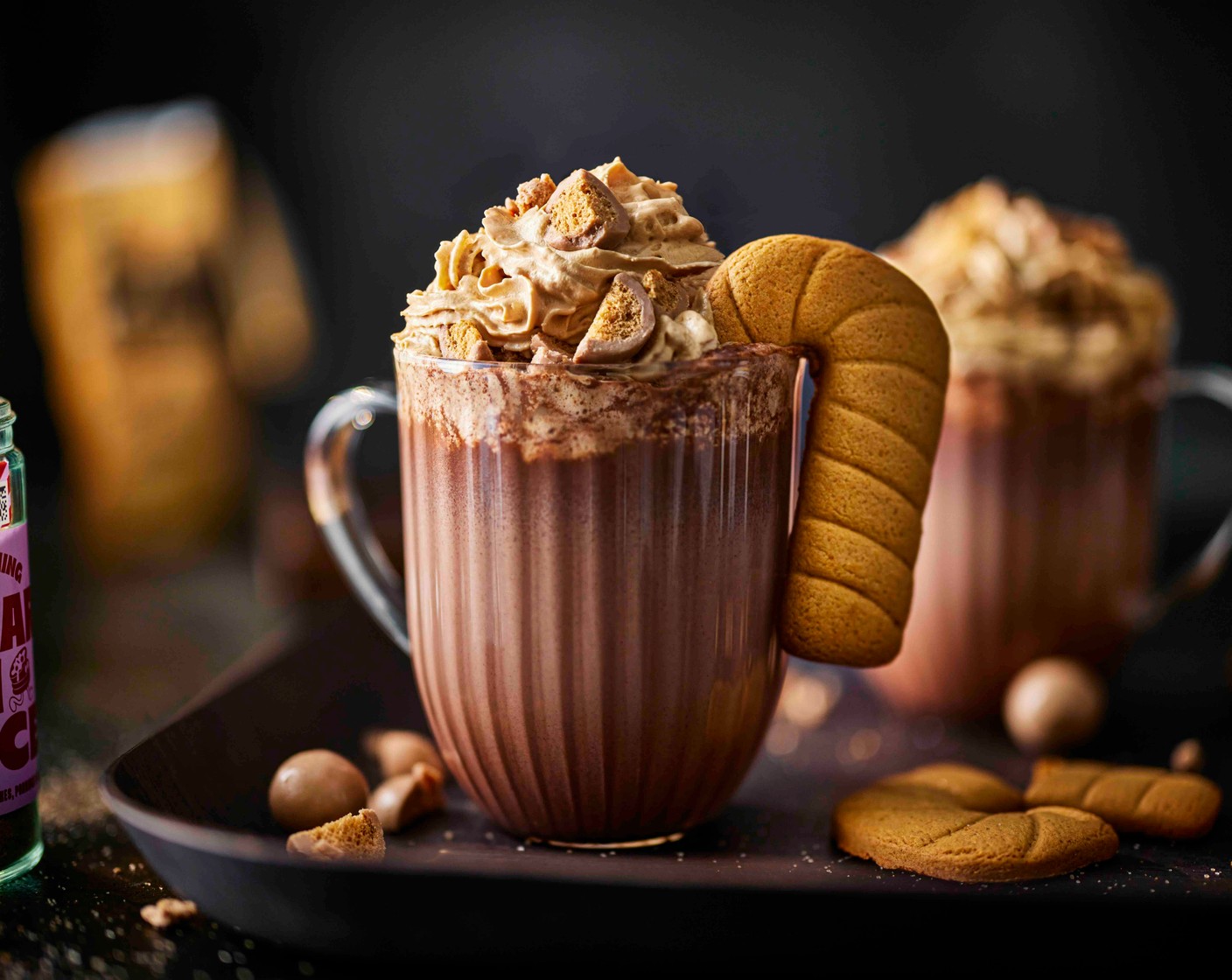 step 4 Ladle into mugs and top with the salted caramel cream (as needed), crushed malt balls (as needed) and mug hangers (8), if using.