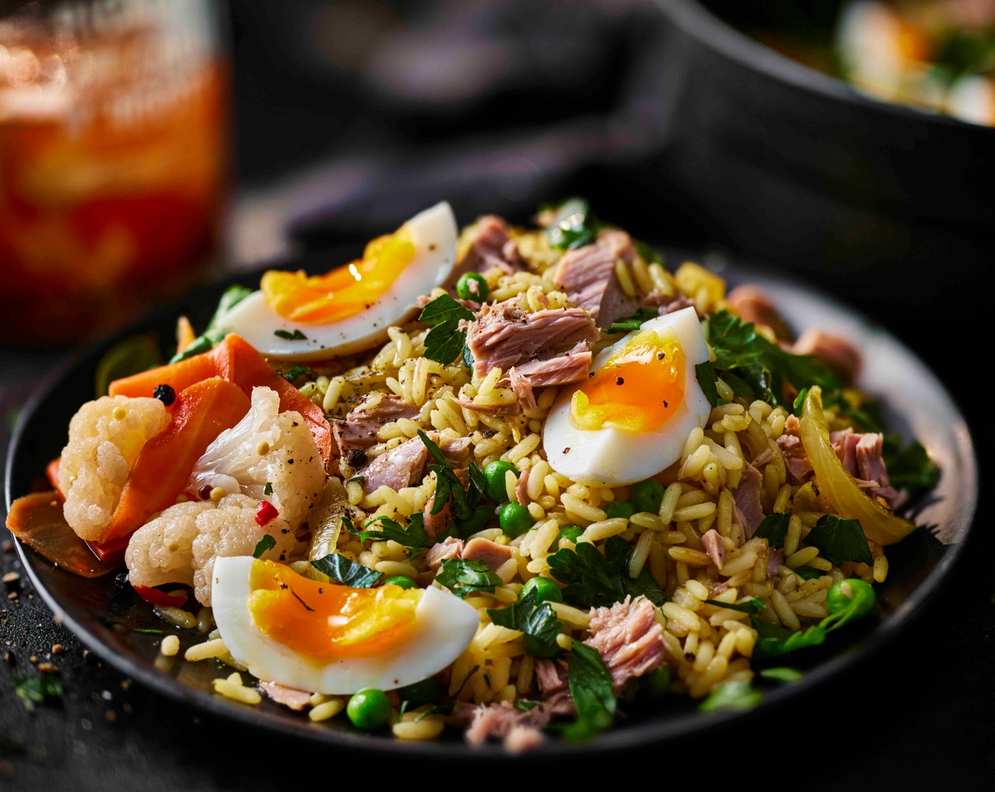 step 5 Peel the eggs and cut into quarters. Fluff up the rice with a fork, then serve topped with the eggs and a scattering of parsley (1 handful) and the pickles (as needed) on the side.