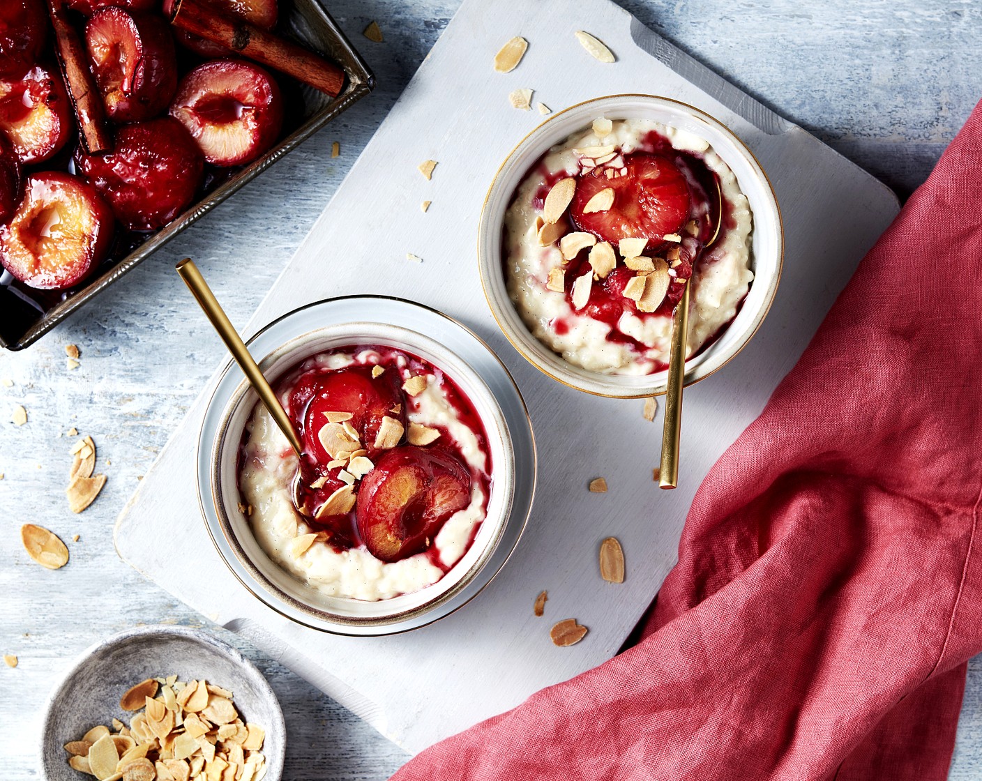step 3 Top the cooked rice pudding with the plums, the remaining maple syrup (2 tbsp) and the almonds (to taste).