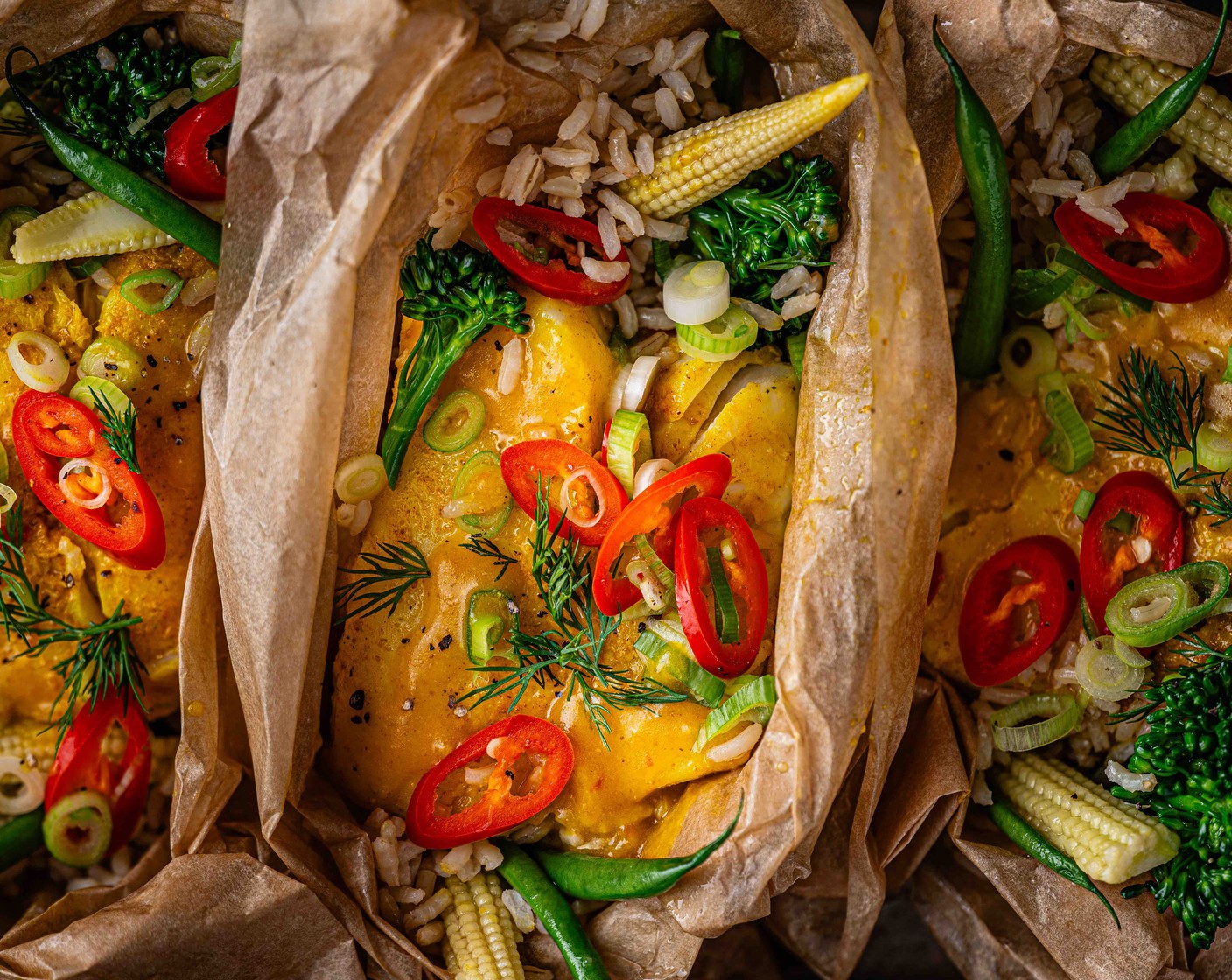 step 6 Open the parcels and finish with more dill, spring onions and red chilli.