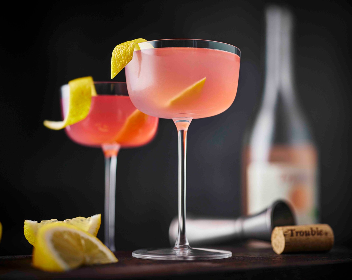 step 3 Top up with the cloudy rosé (180 ml) and a dash of soda water (to taste) to bring the bubbles, and garnish with the lemon peel.